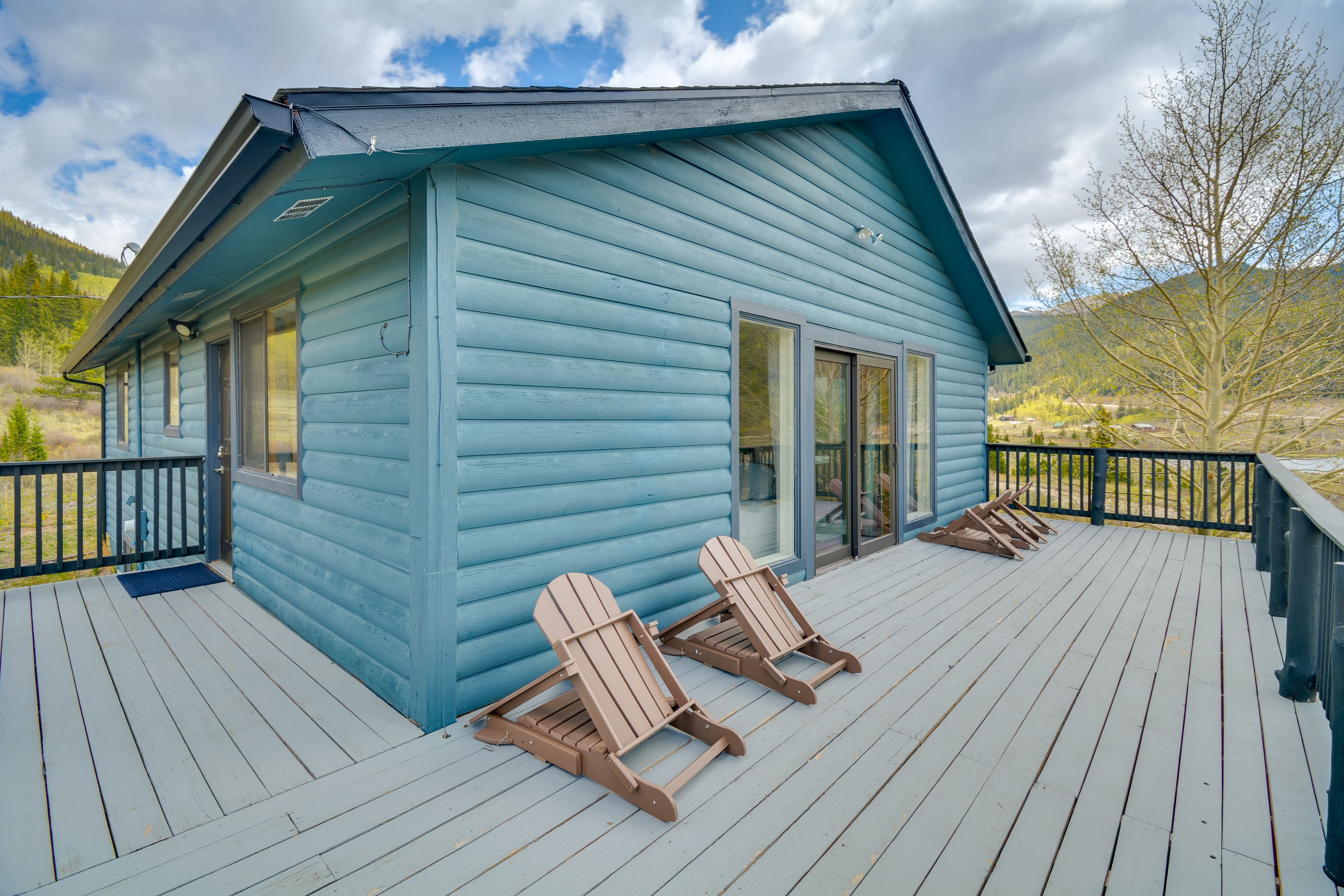 Cabin Exterior | Deck w/ Seating | Mountain Views