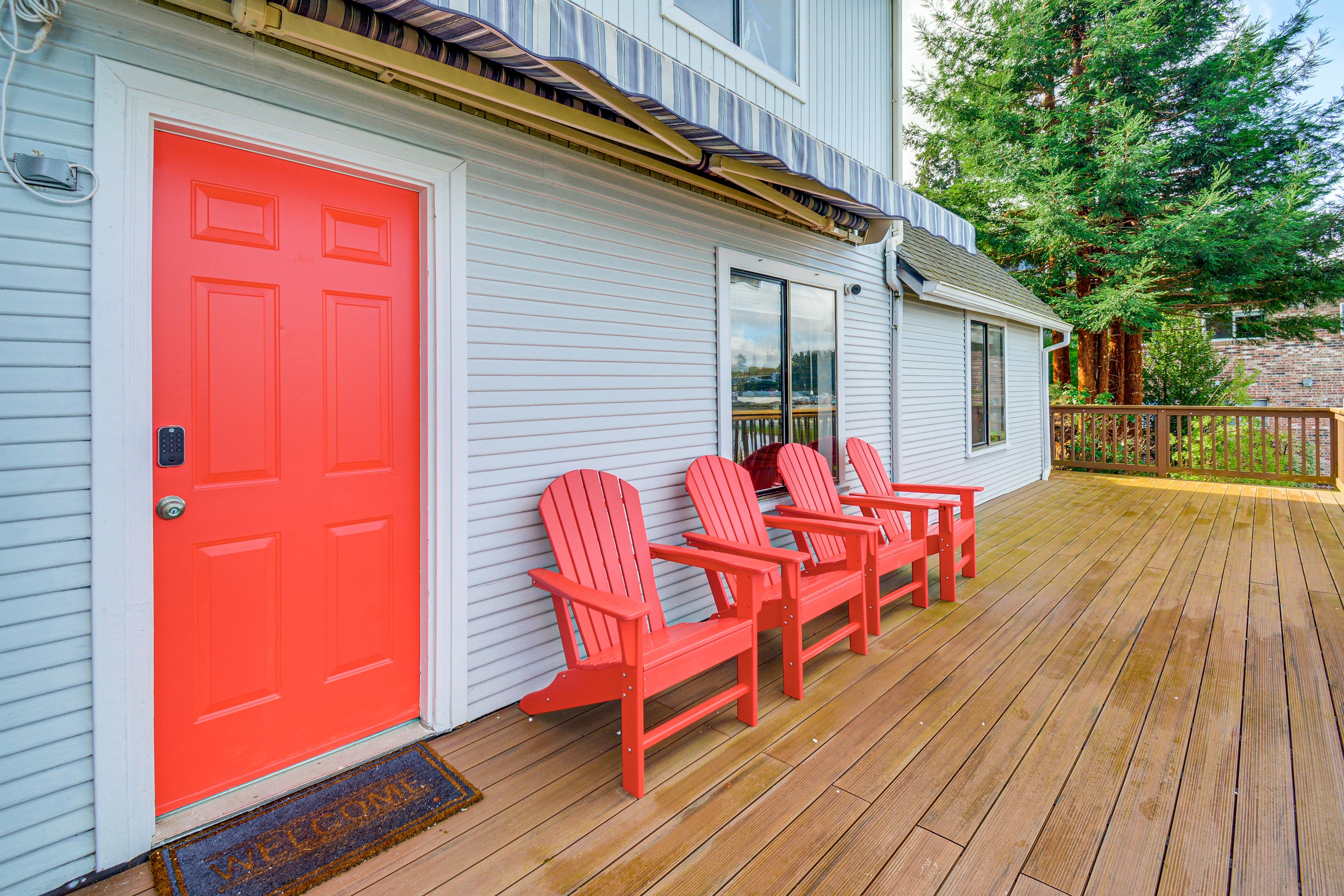 House Exterior | Furnished Deck | Inlet & Mountain Views