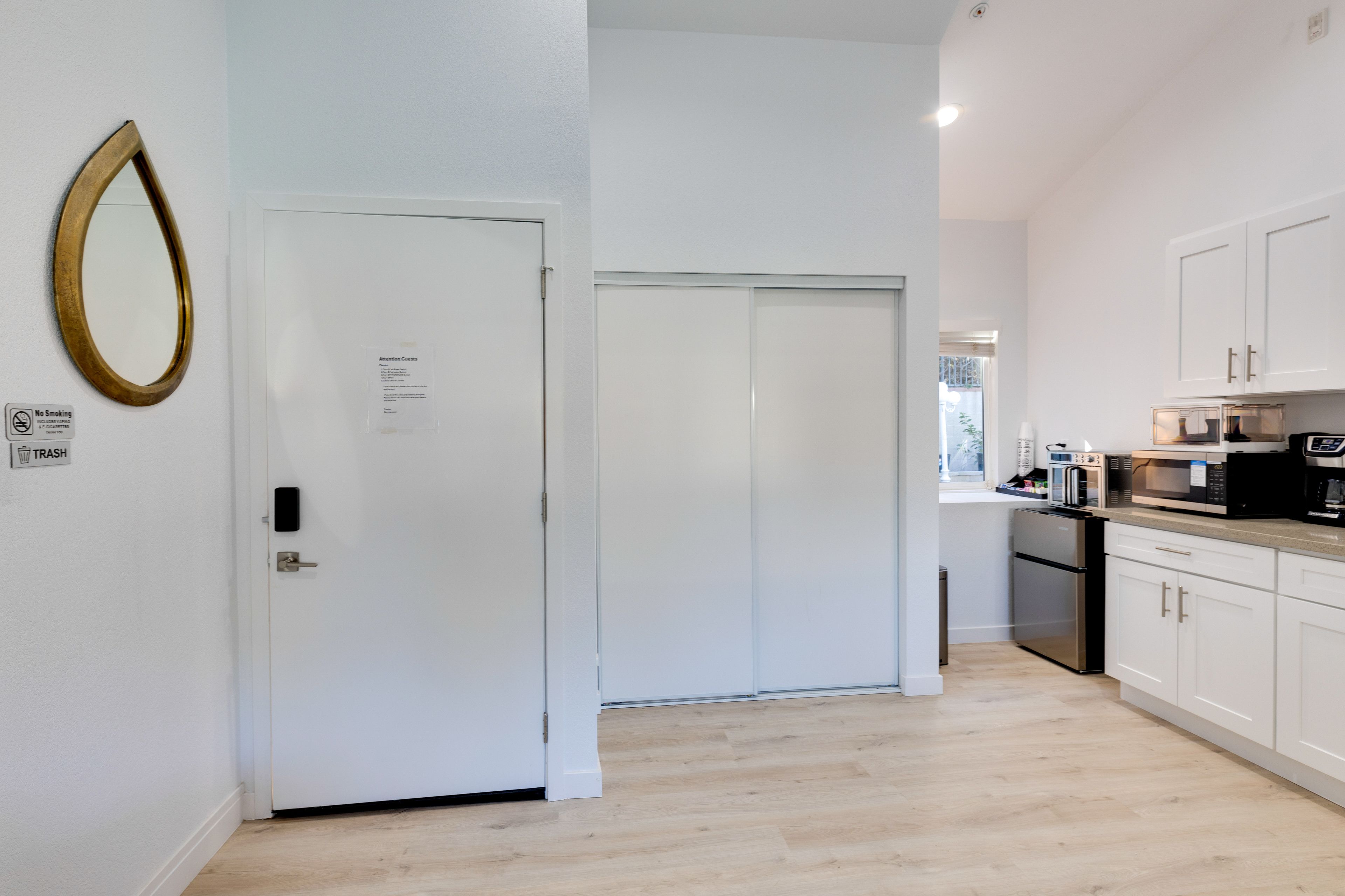 Storage Closet | Folding Dining Table | Hangers | Iron & Board