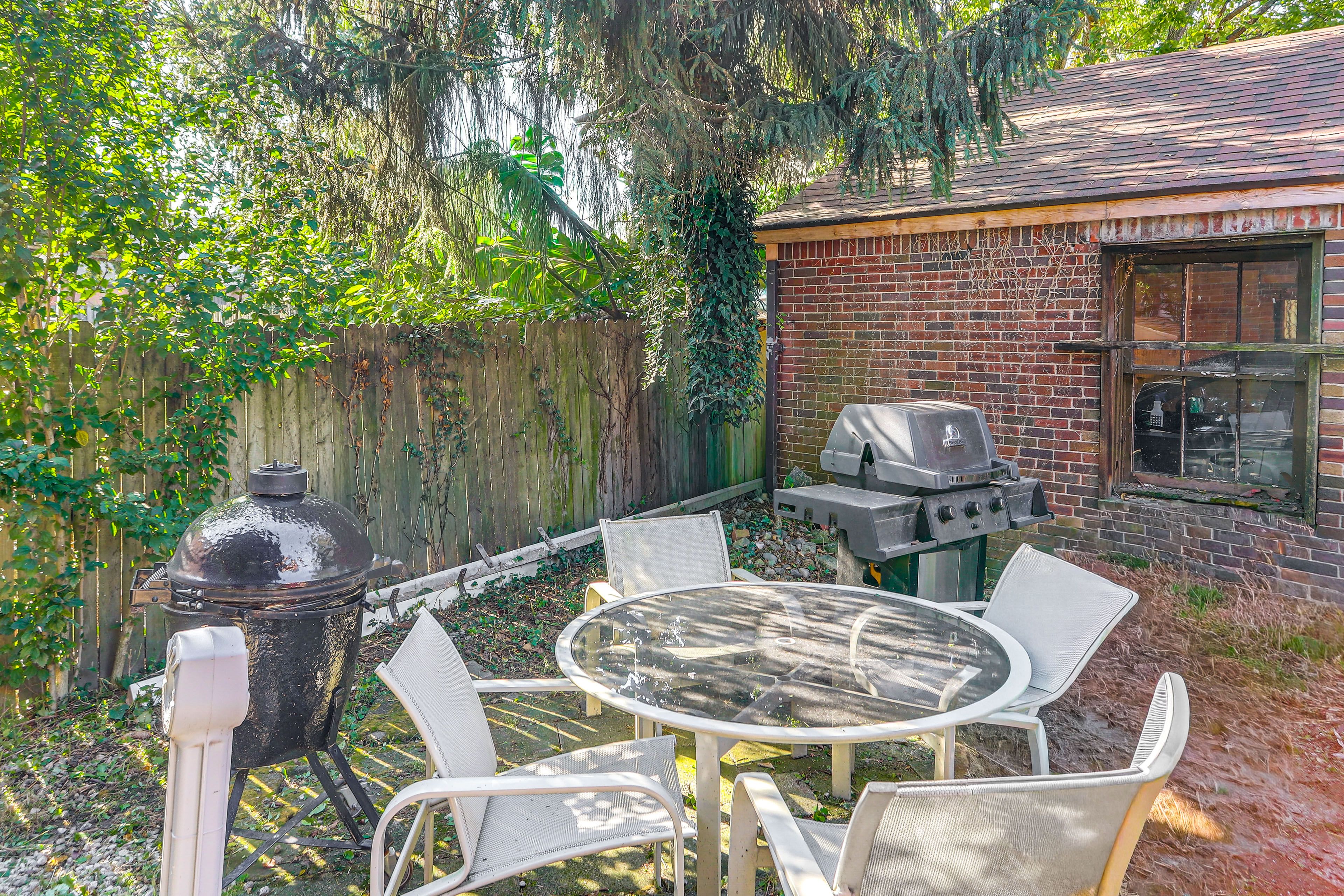 Apartment Exterior | Patio w/ Dining Area | Gas & Charcoal Grills