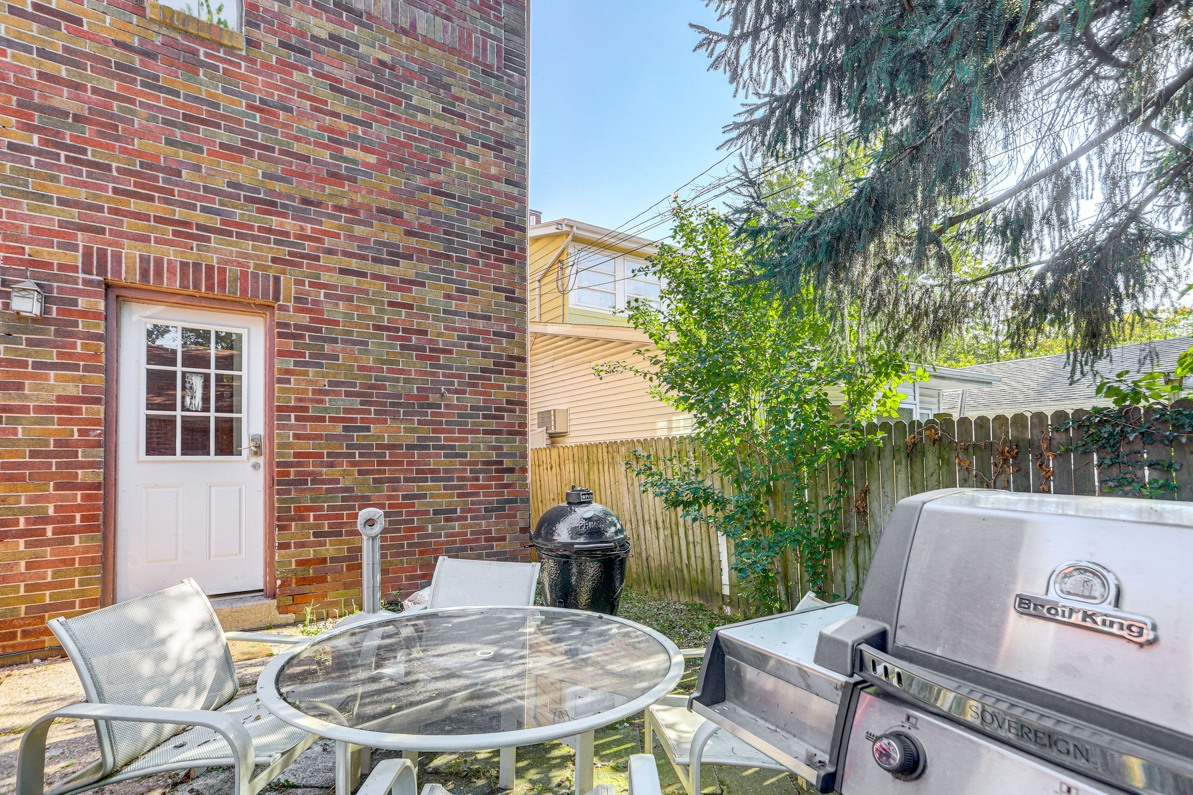 Apartment Exterior | Patio w/ Dining Area | Gas & Charcoal Grills