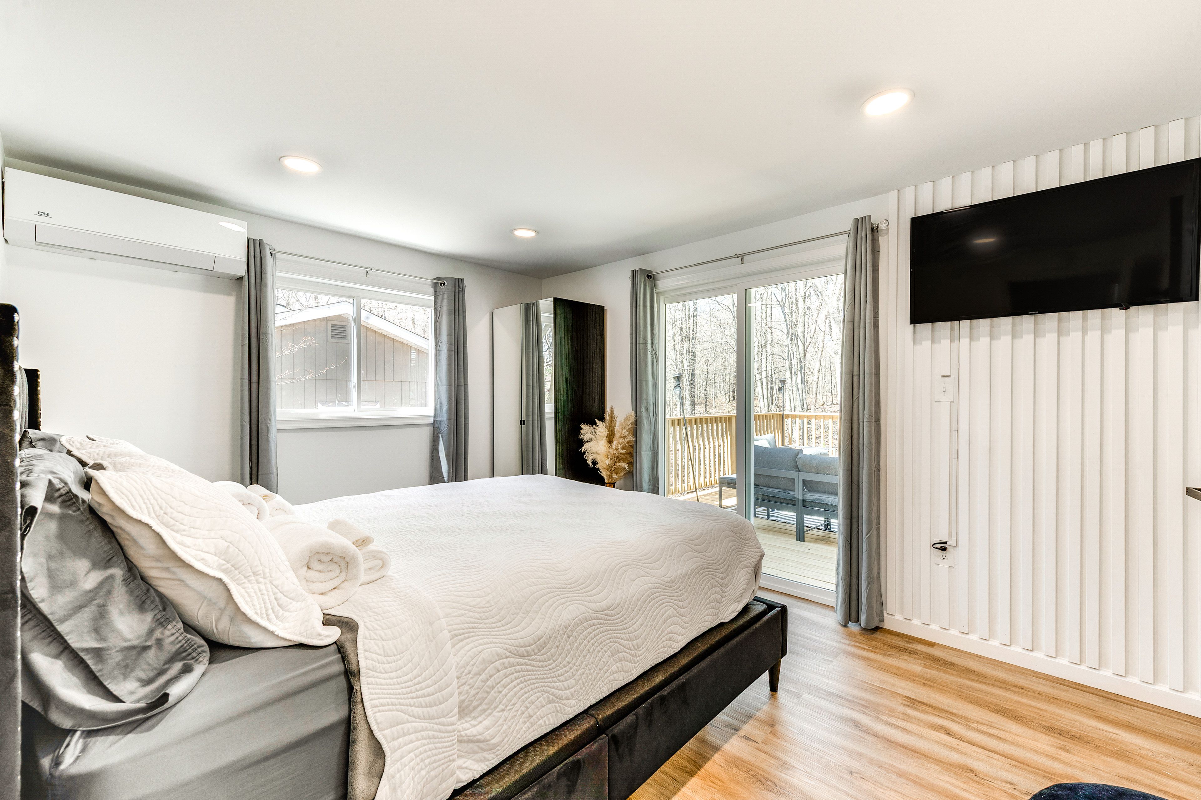 Bedroom 1 | Queen Bed | Linens Provided | En-Suite Half Bathroom