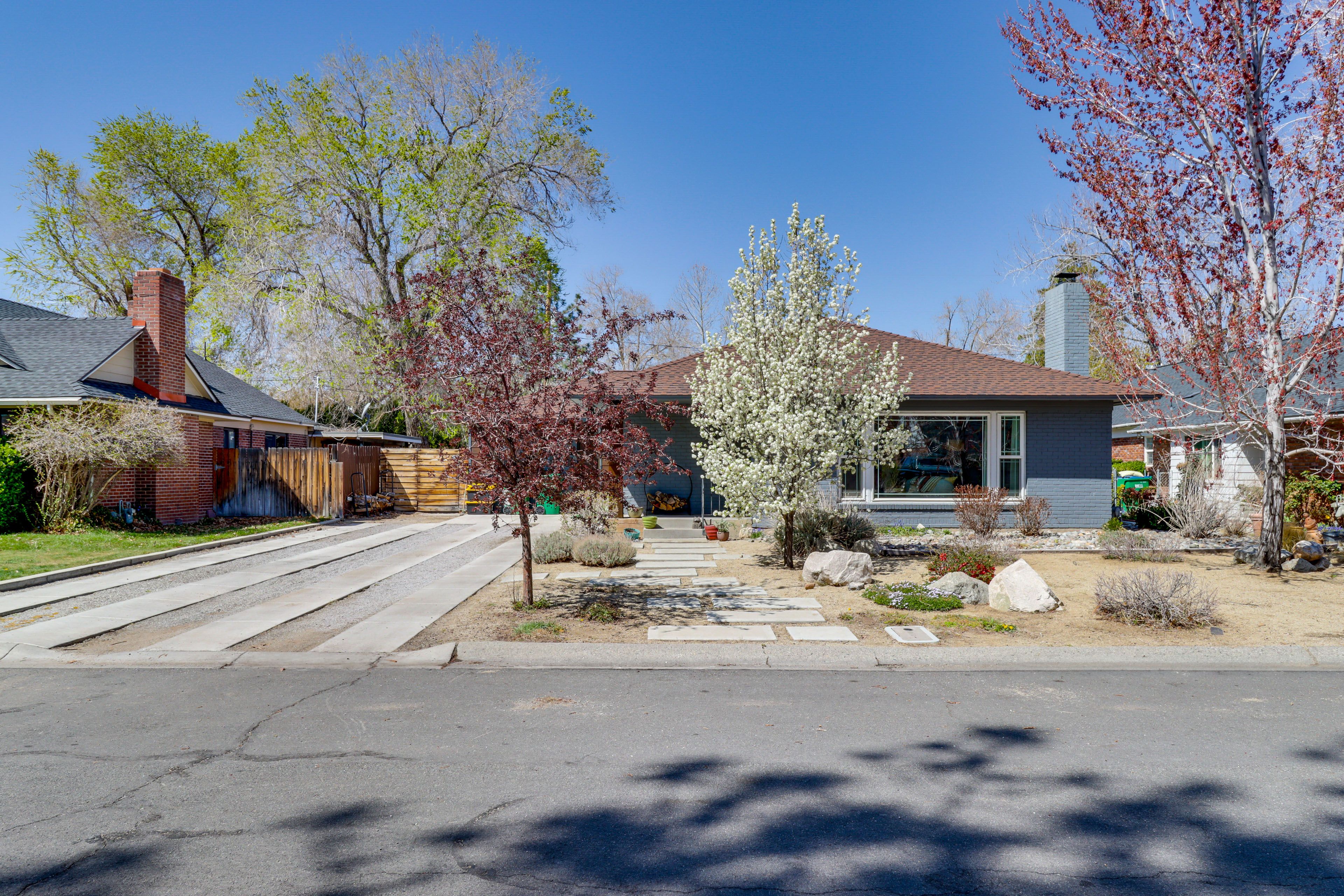 Property Exterior | 2-Story Home | Fenced Yard | Trampoline | Fire Pit