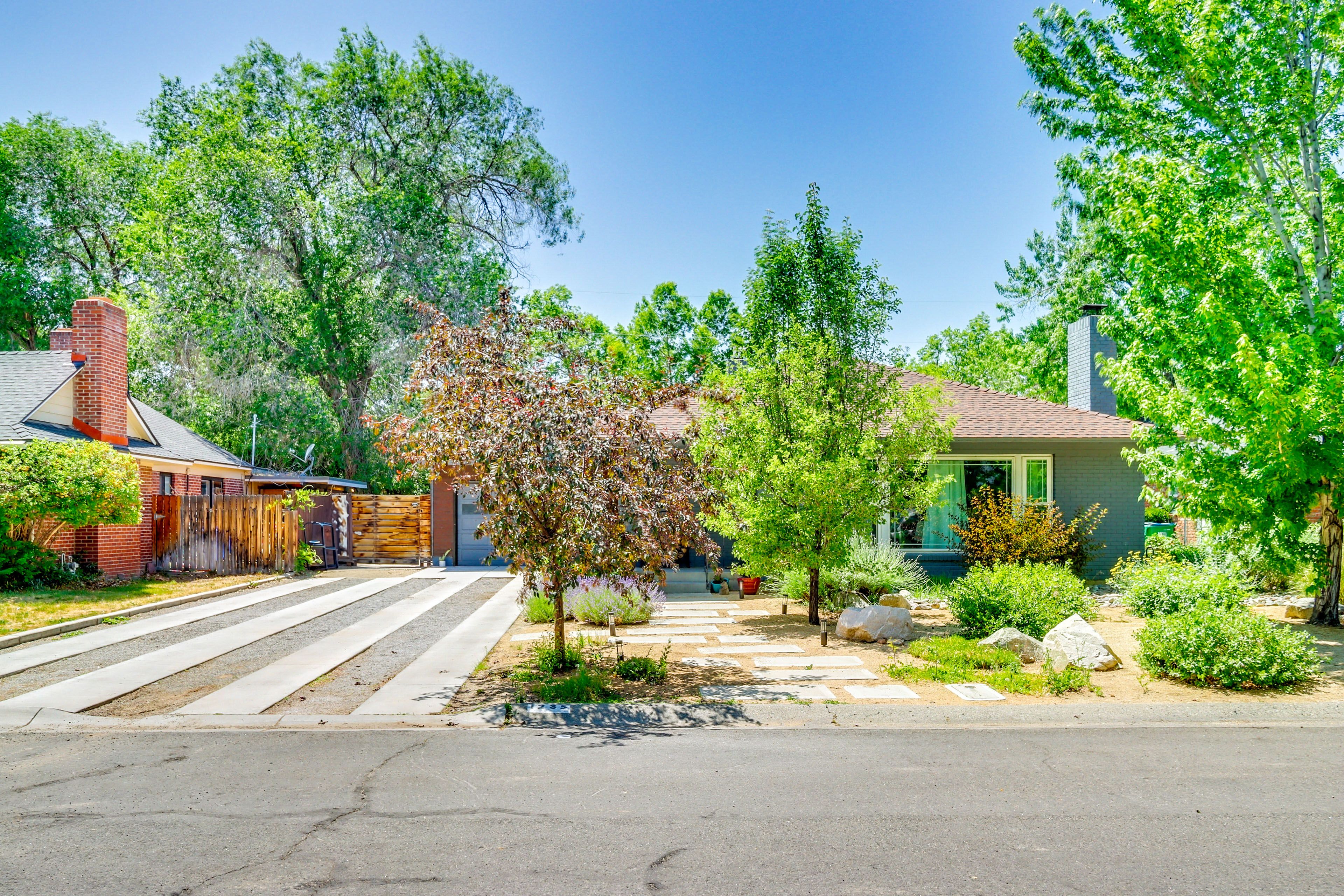 Property Exterior | 2-Story Home | Fenced Yard | Trampoline | Fire Pit