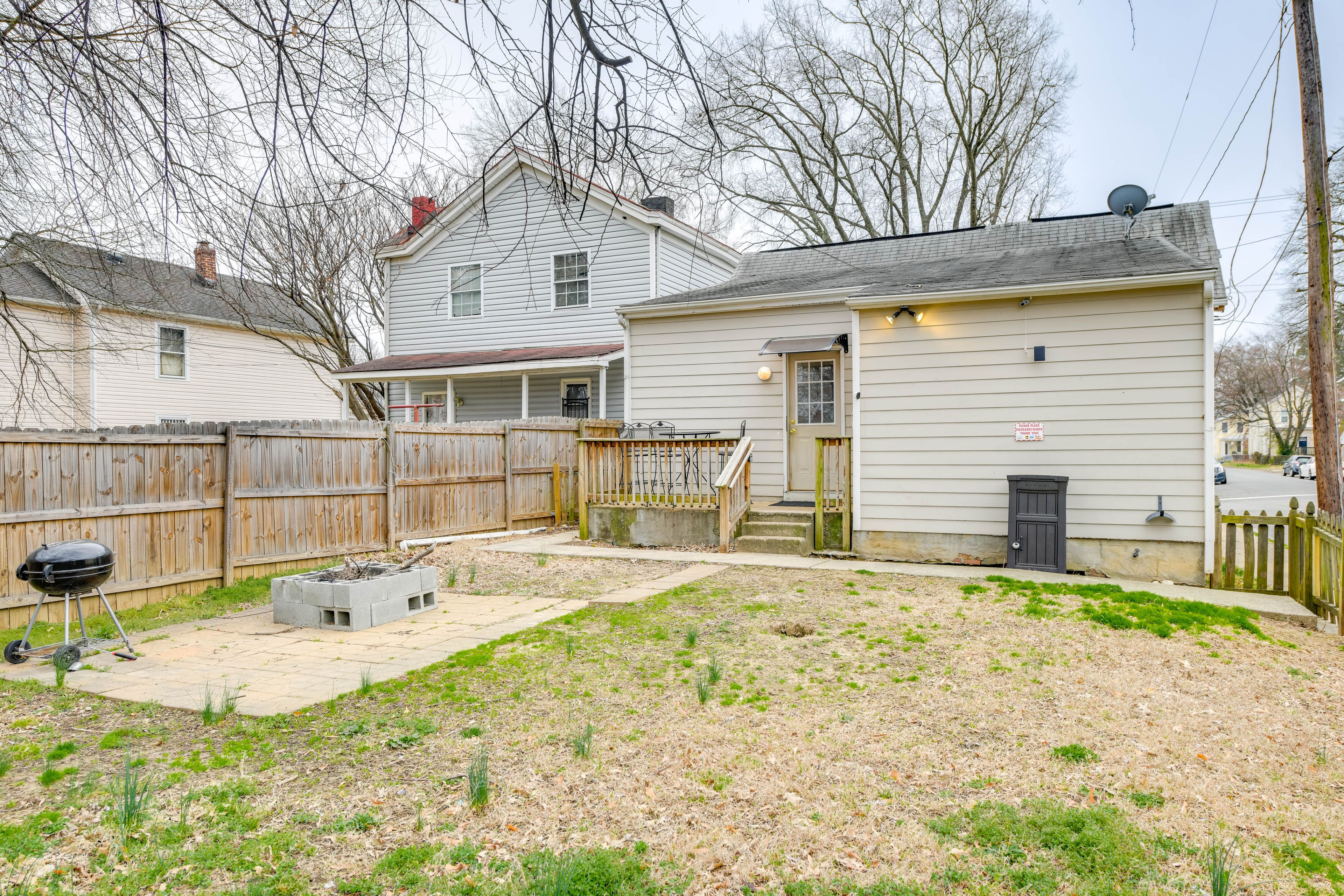Back Exterior | Fenced Yard | Charcoal Grill | Single-Story Home