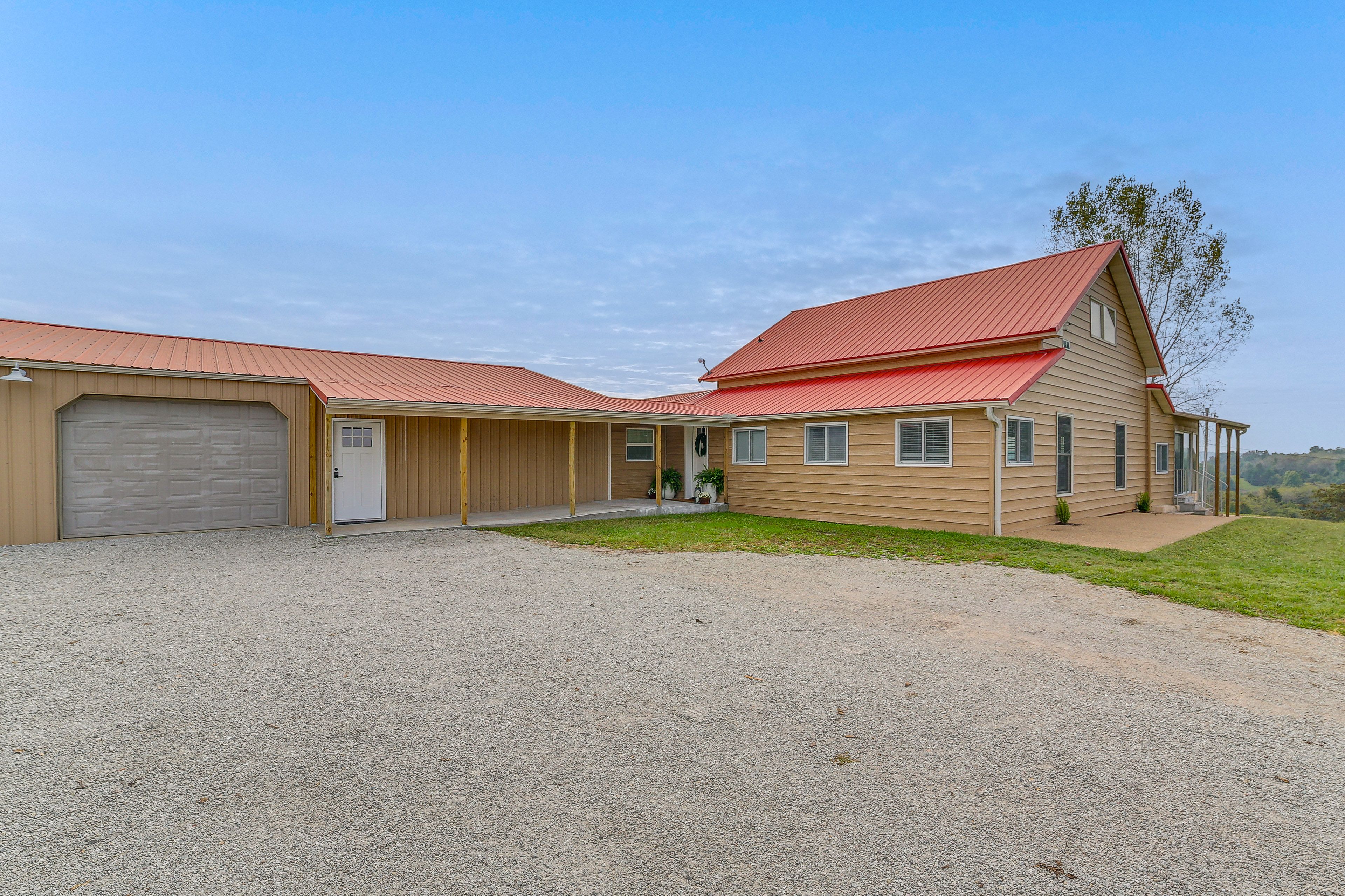 Home Exterior | Parking | Garage (2 Vehicles) | Driveway (4 Vehicles)