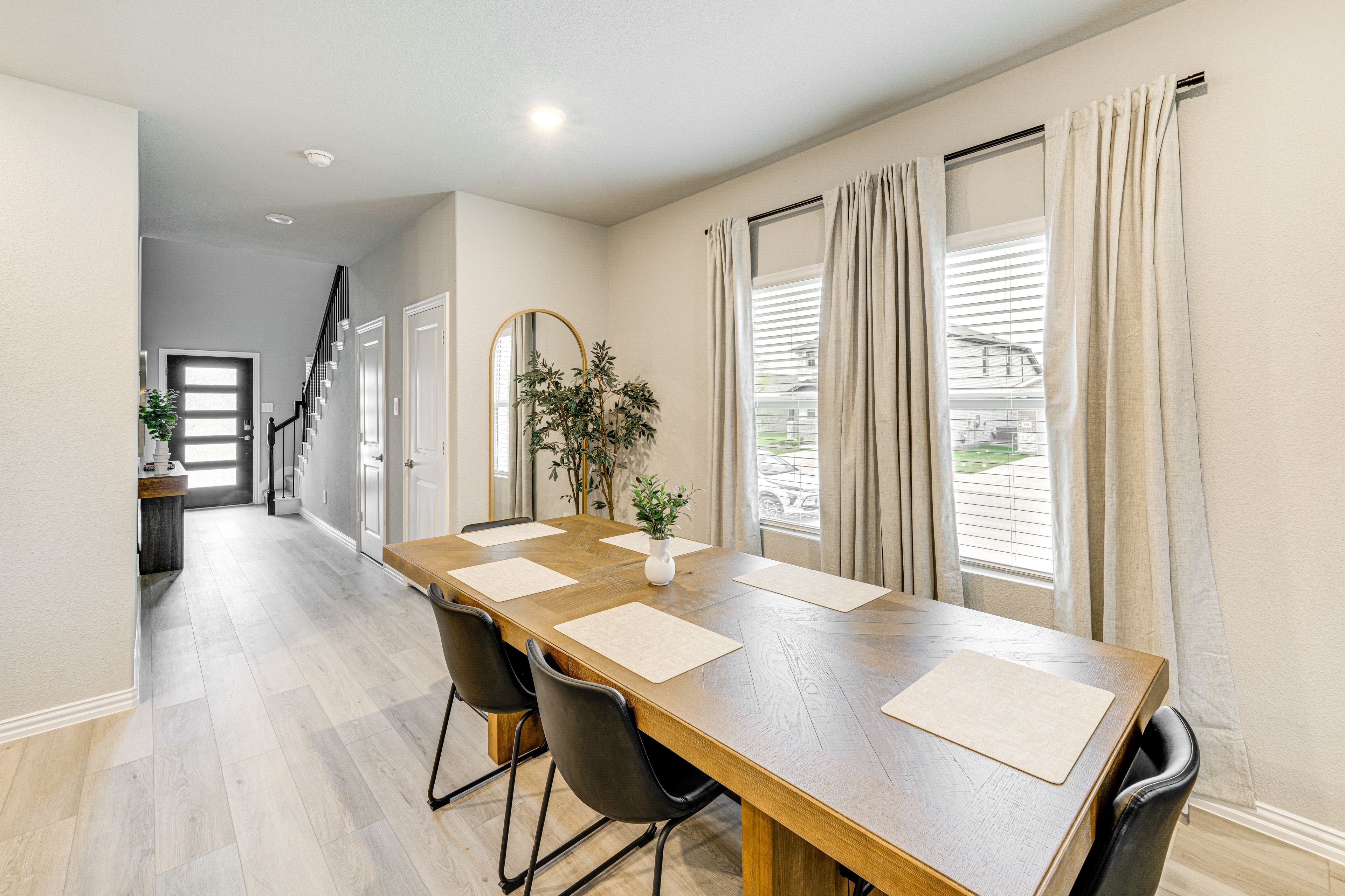 Dining Area | Dishware & Flatware | Central A/C & Heat | 1st Floor
