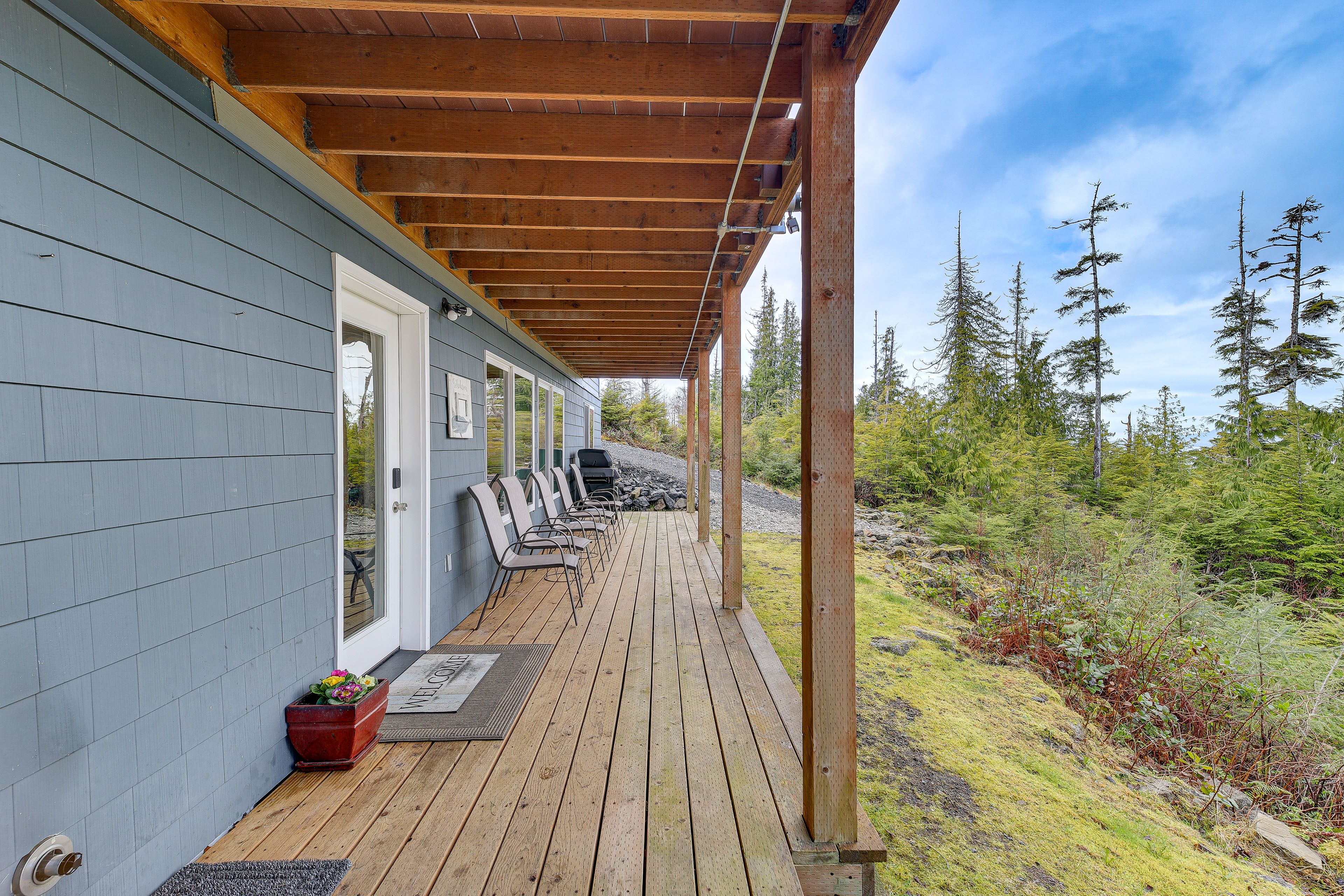 Porch | Gas Grill | Seating | Peekaboo Water Views