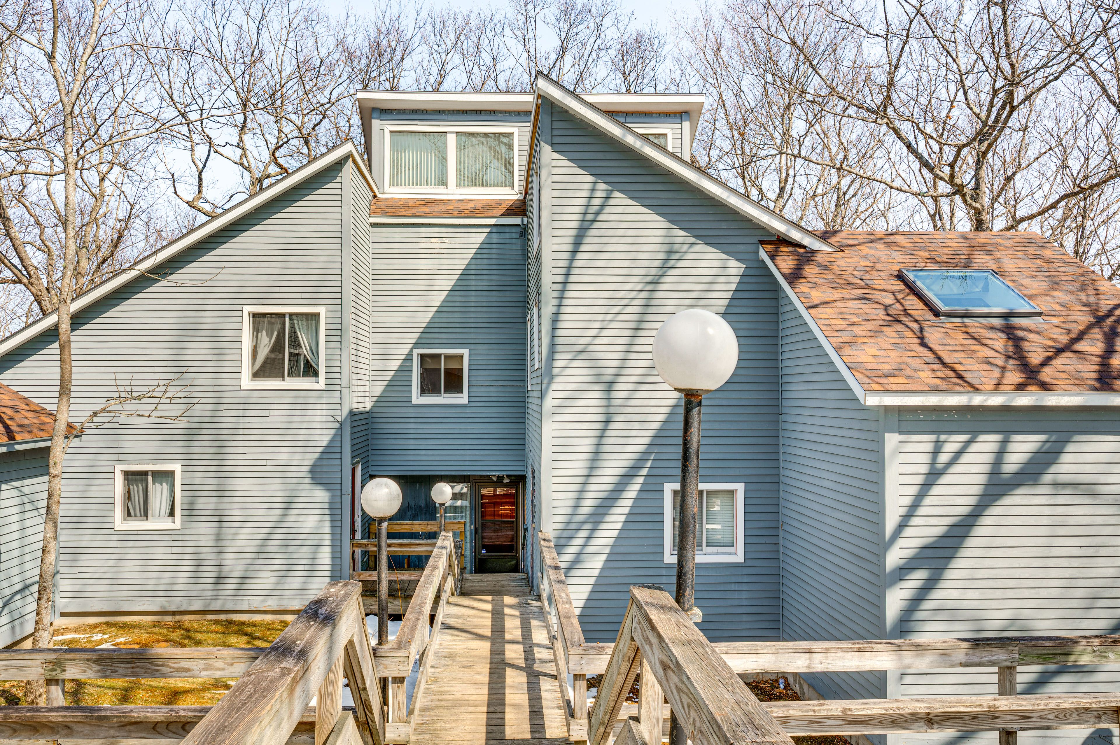 Property Exterior | Community Parking Lot (First-Come, First-Served)