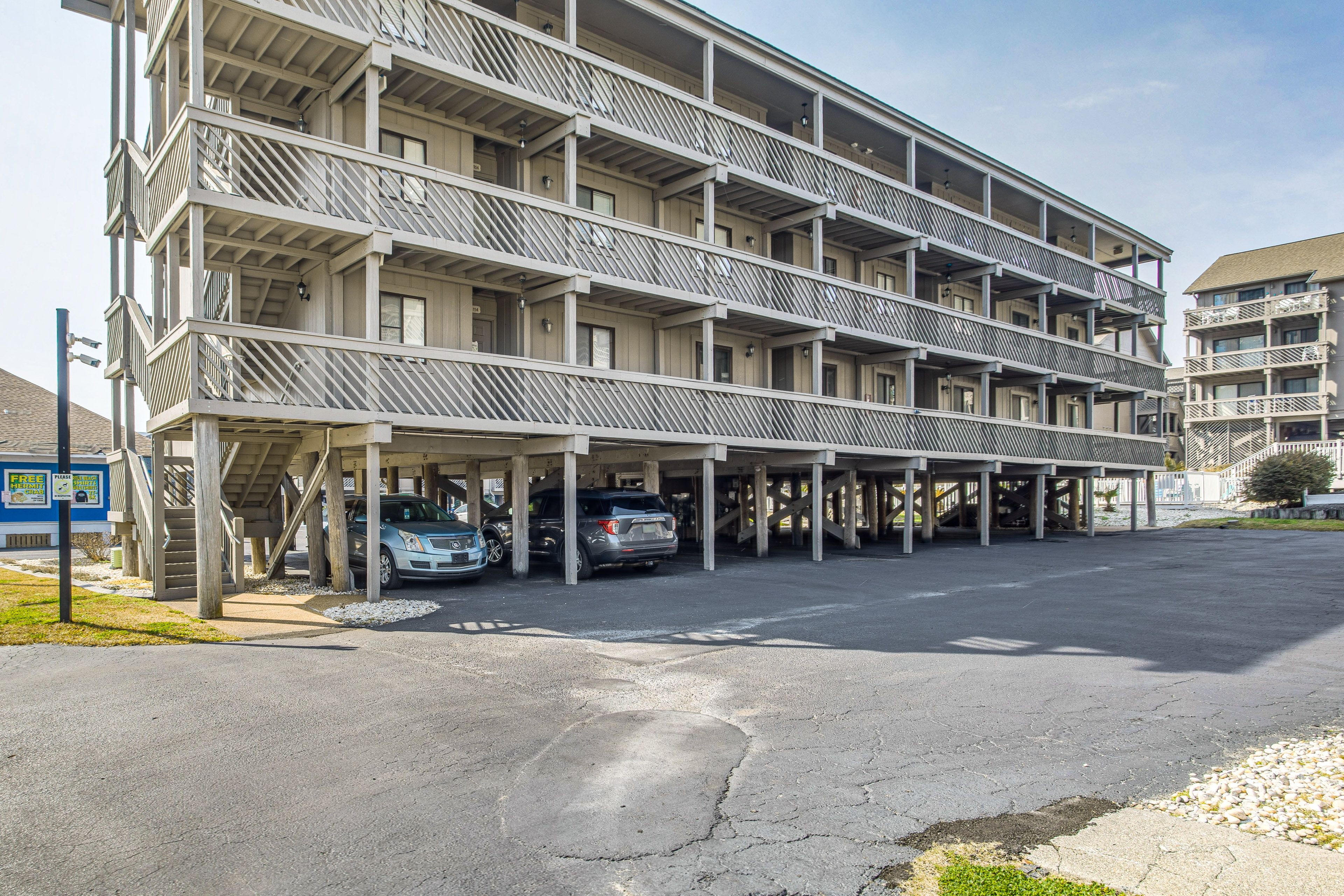 Condo Exterior | Parking | Community Lot (First-Come, First-Served)