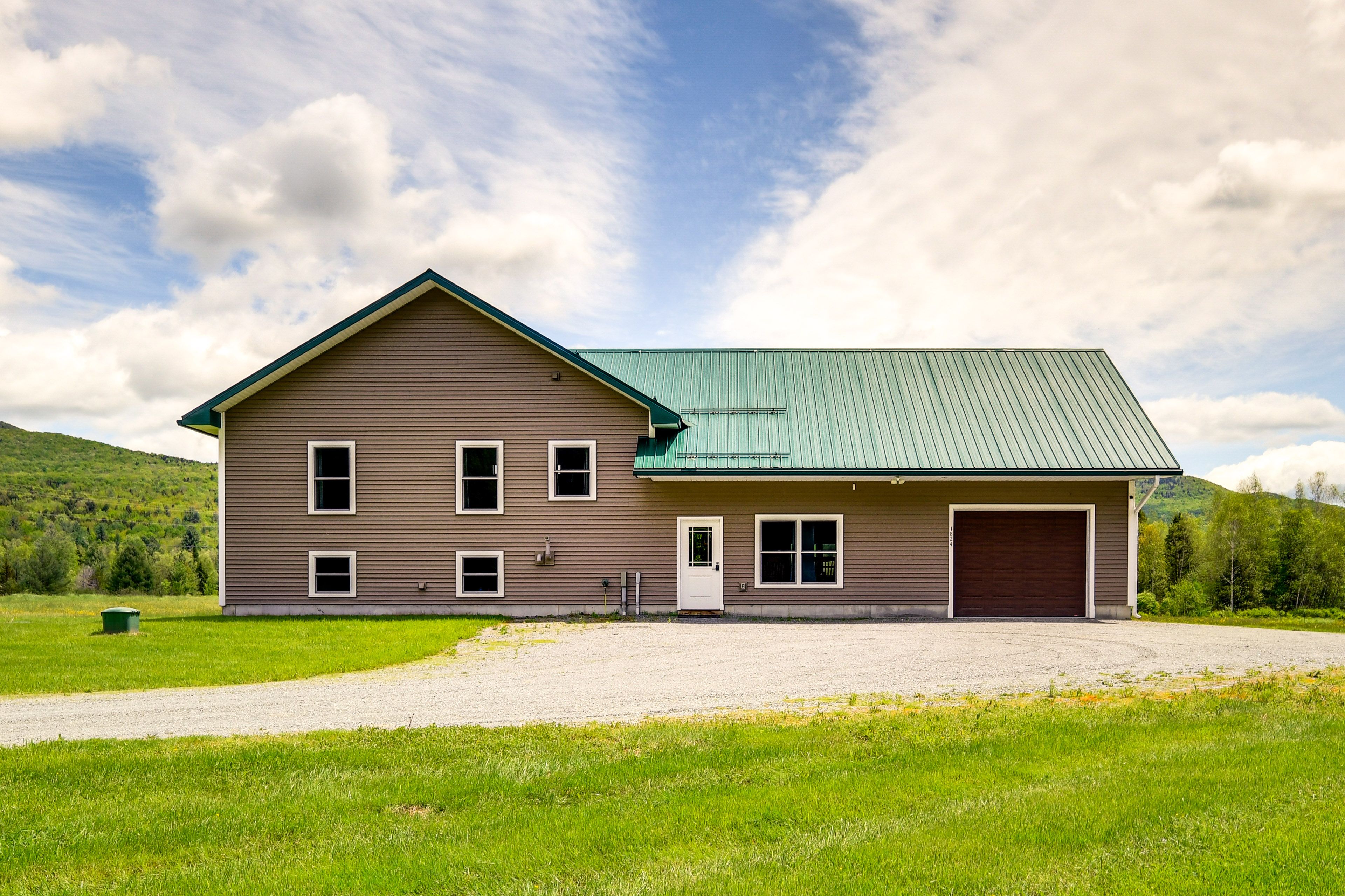 Exterior | Driveway (5 Vehicles) | 6 Mi to Jay Peak Resort