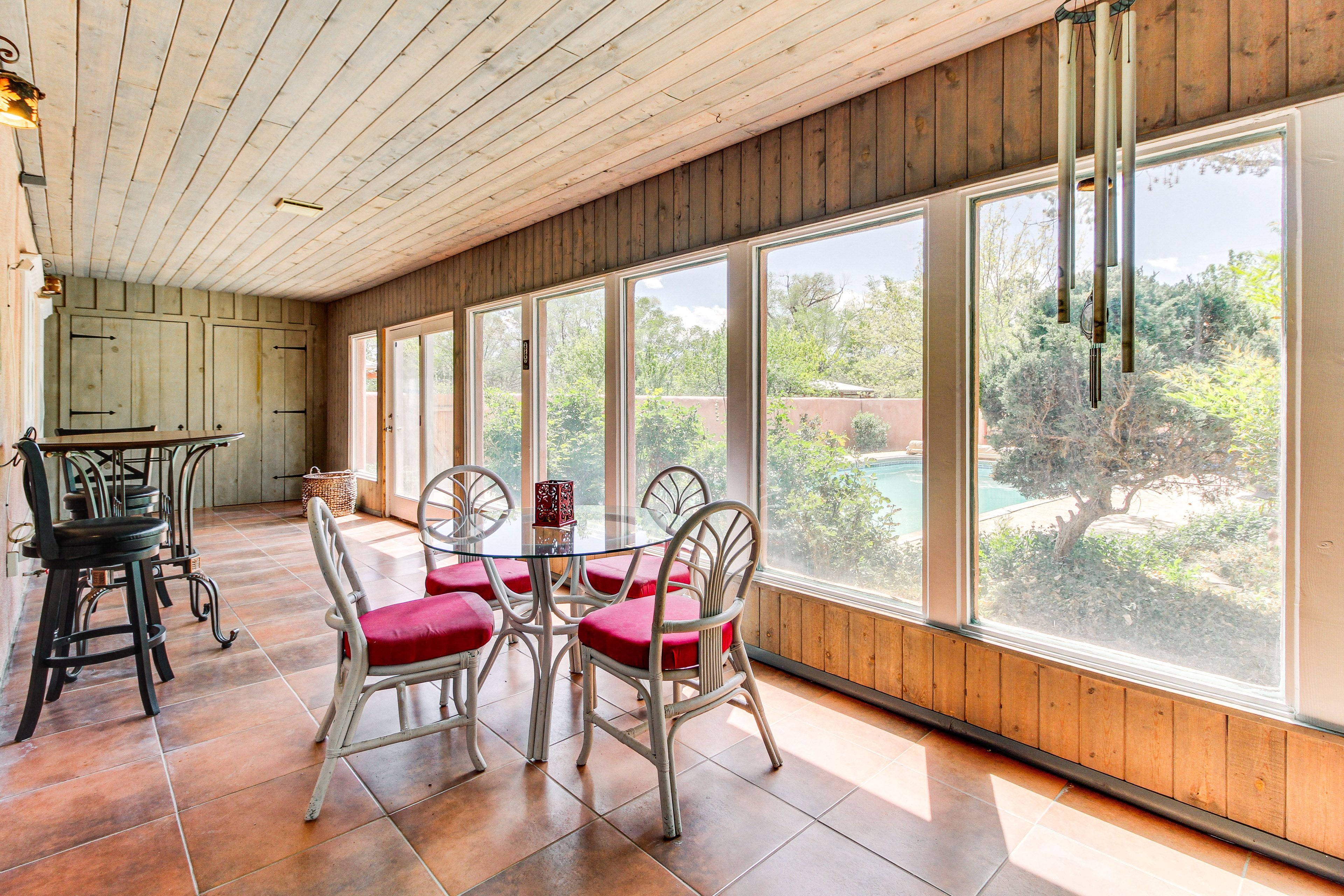 Enclosed Sunroom | Dining Areas | Pool Views | Free WiFi