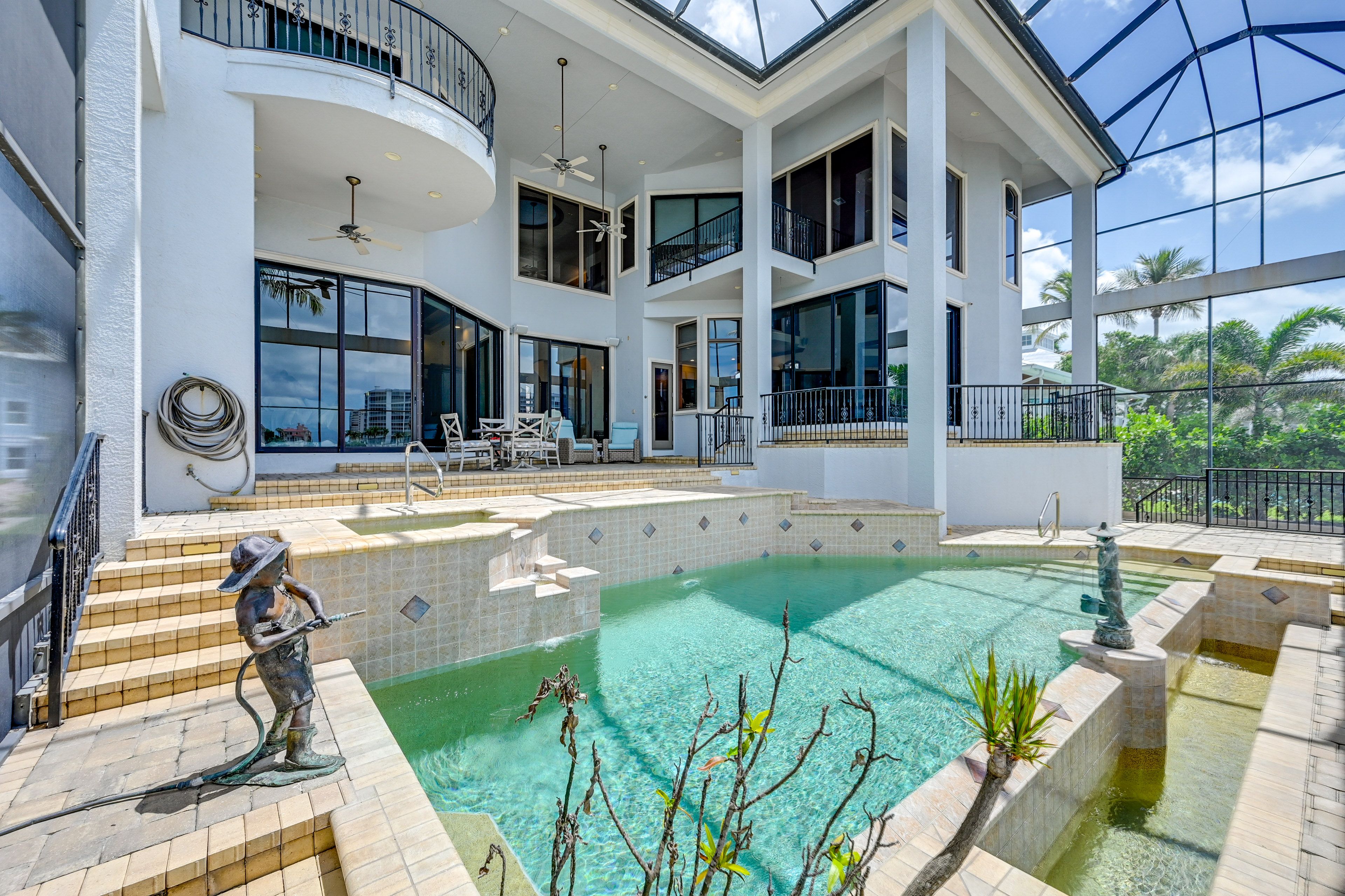 Naples Vacation Rental | 3BR | 3.5BA | 5,100 Sq Ft | Stairs Required to Enter