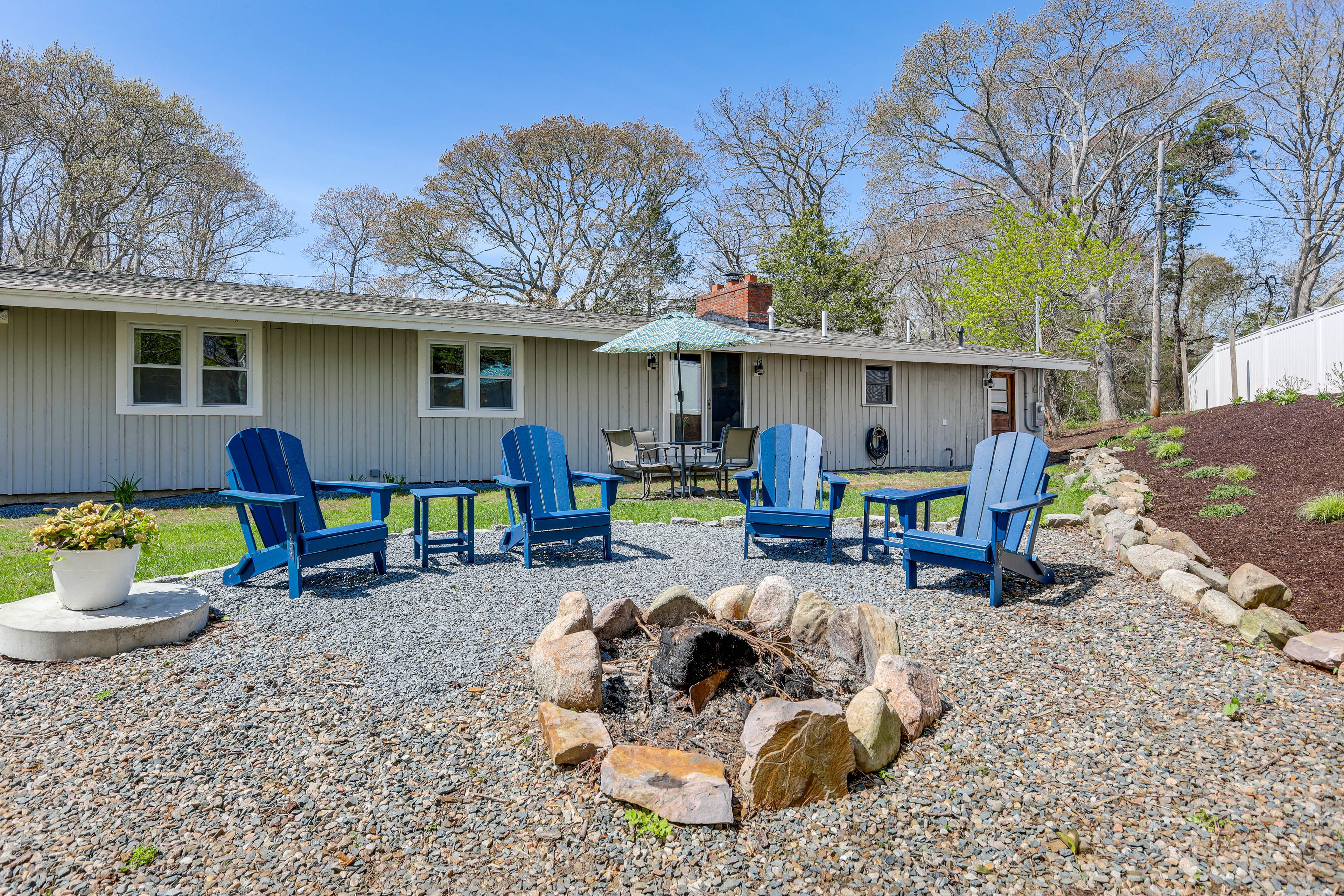 Backyard | Fire Pit | Shaded Dining Table | Covered Patio