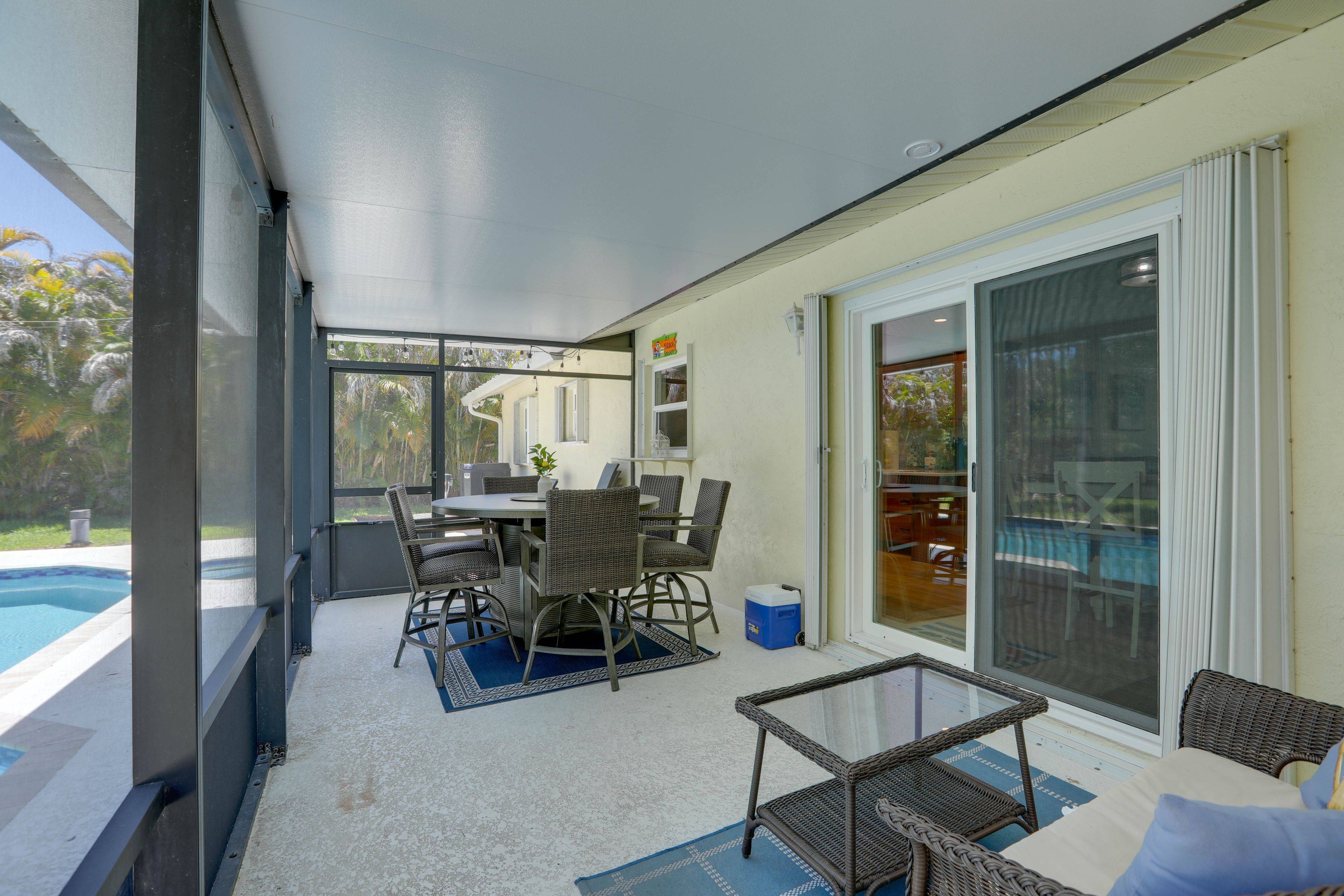 Exterior | Screened-In Lanai | Outdoor Dining | Fire Pit Table