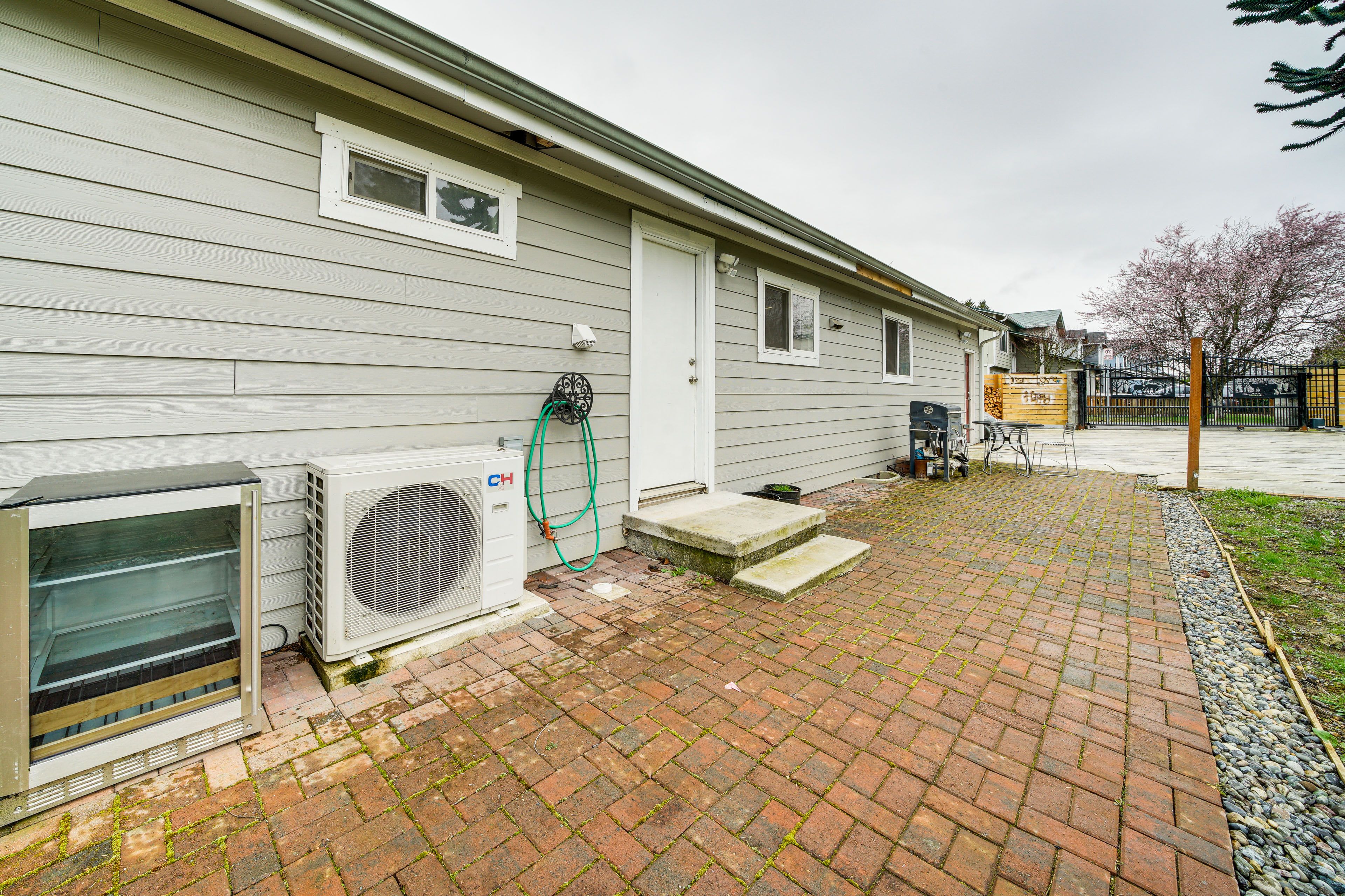 Property Exterior | Patio w/ Charcoal Grill | Fire Pit