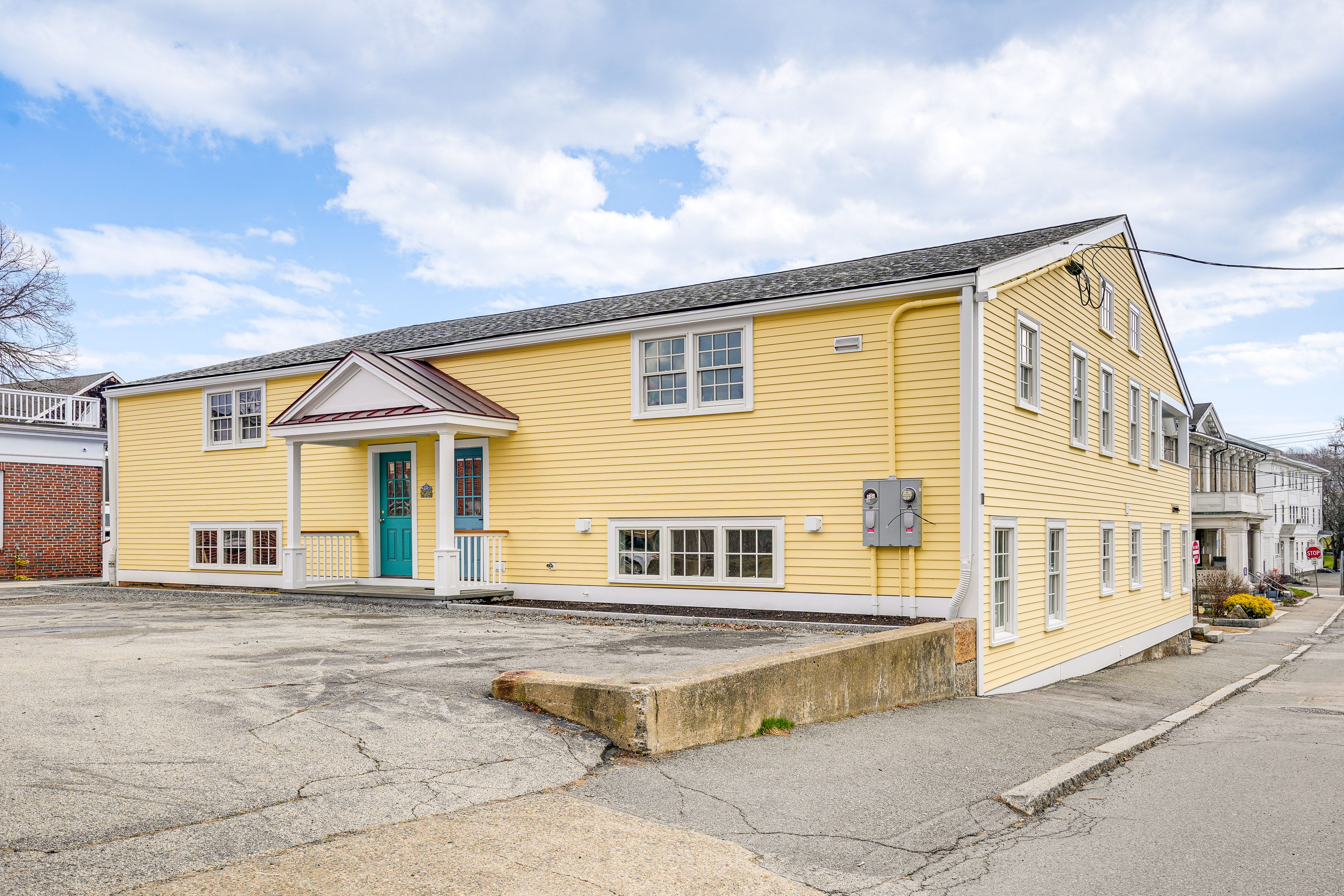 Townhome Exterior | Parking | Community Lot (3 Vehicles)