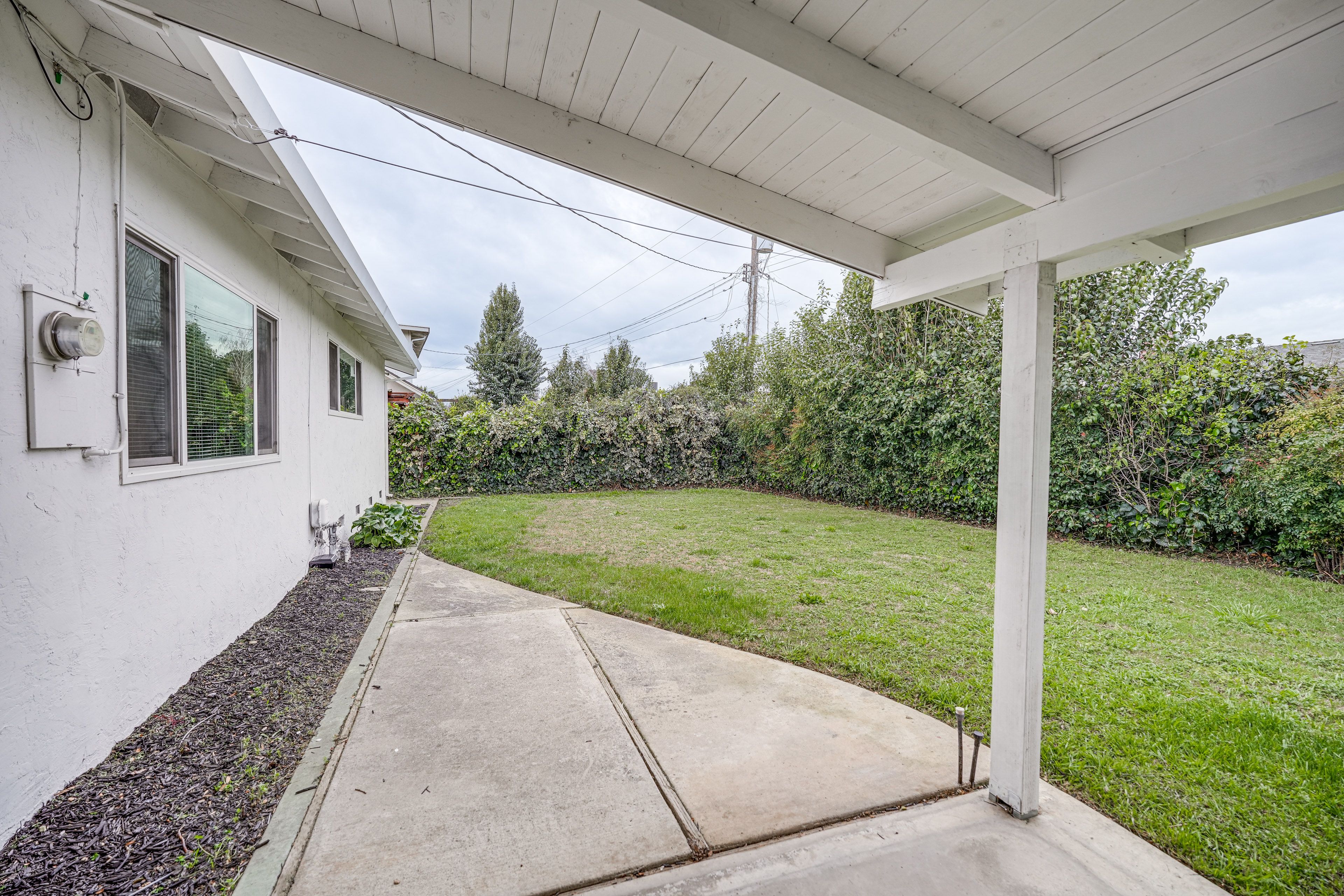 House Exterior | Covered Patio | Fenced Backyard
