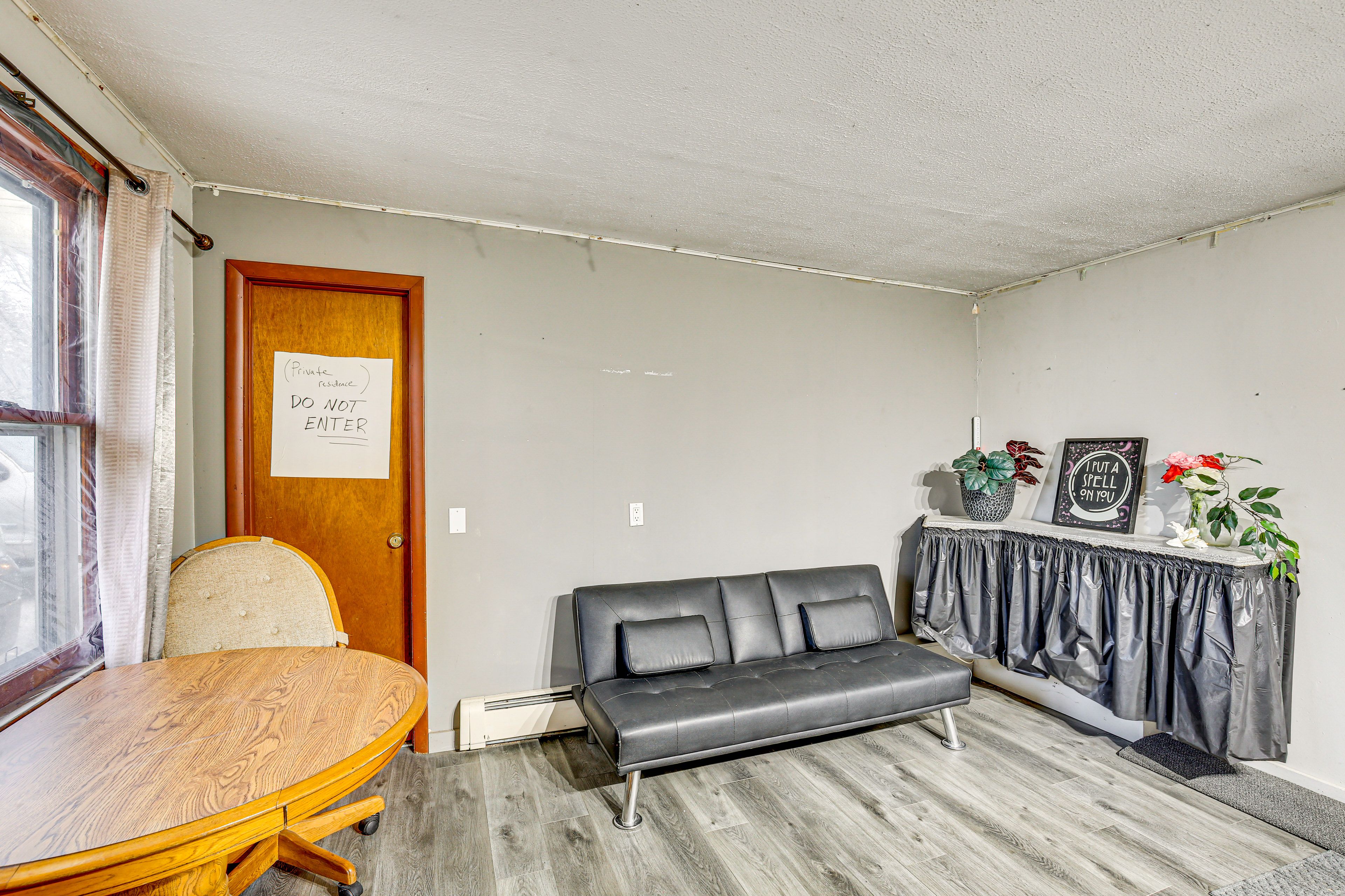 Living Area | Central Heating | Window A/C Unit | Free WiFi