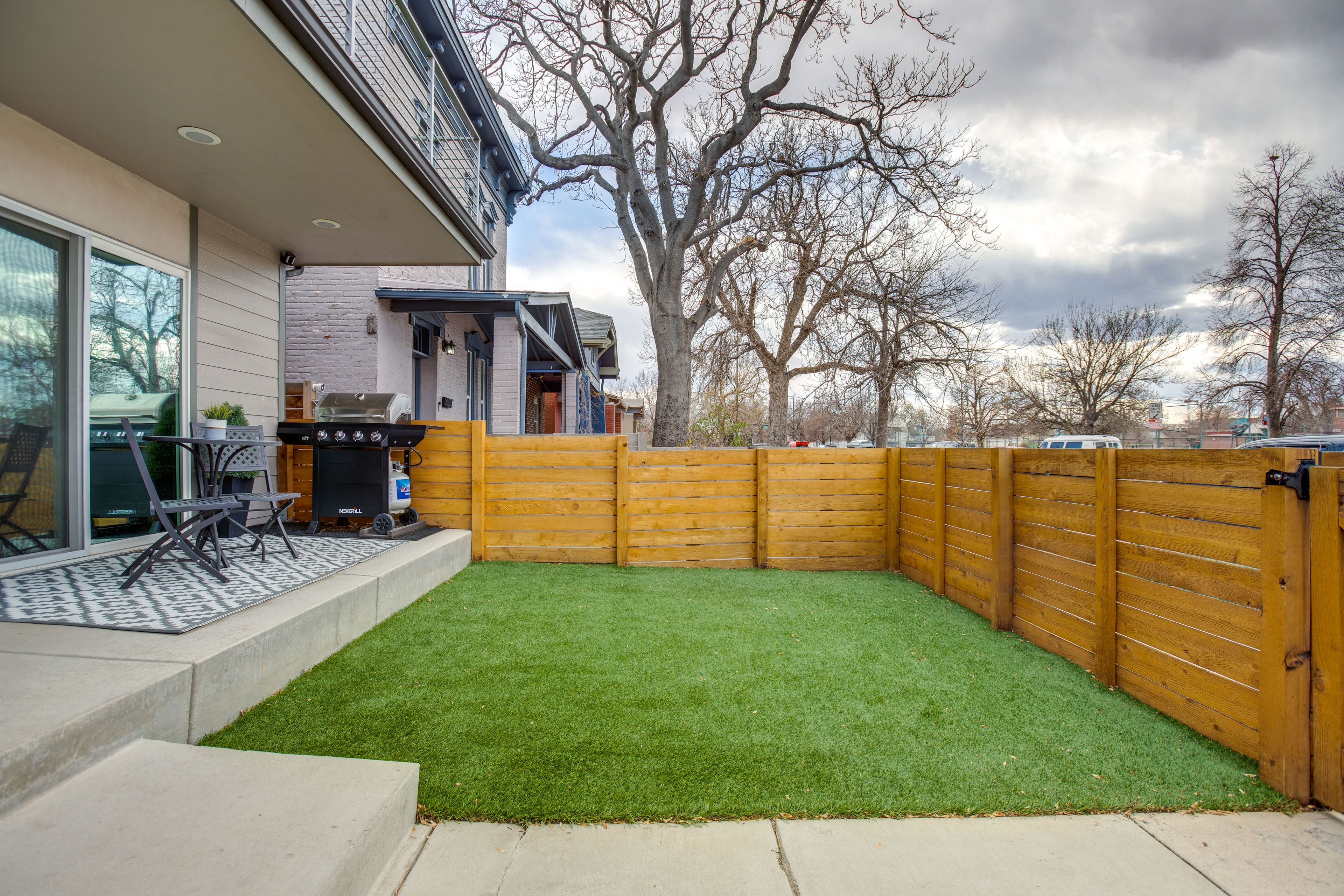 Fenced Yard | Maintenance-Free Turf