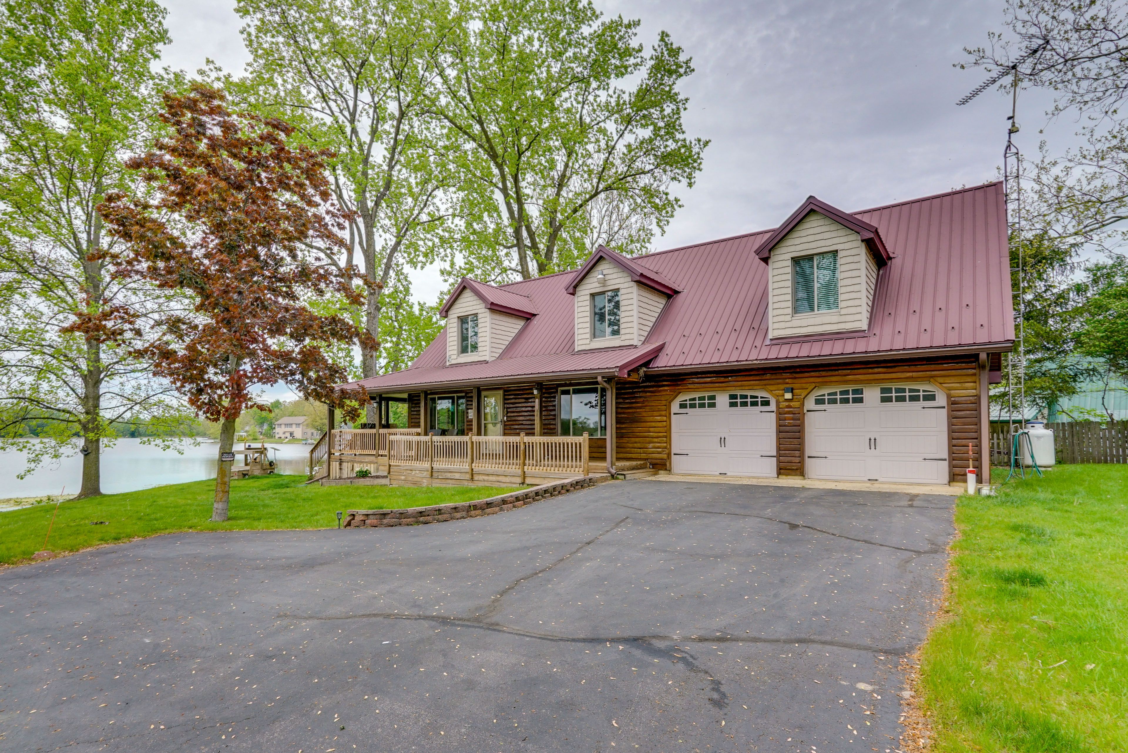 Property Exterior | Private Dock | Wood-Burning Fire Pit | Gas Grill
