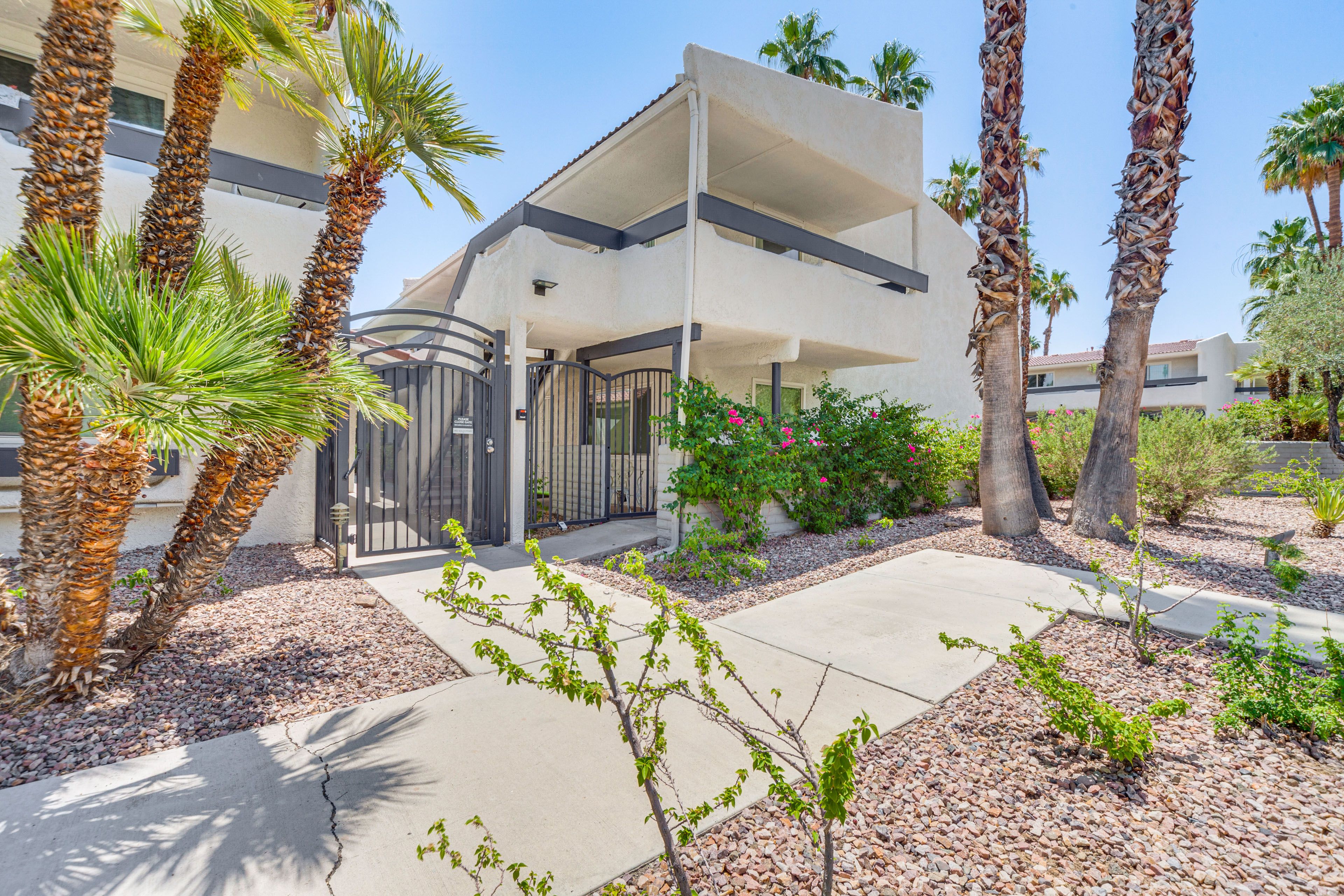Property Exterior | Assigned Carport (1 Vehicle) | Addt'l Guest Parking (Open)