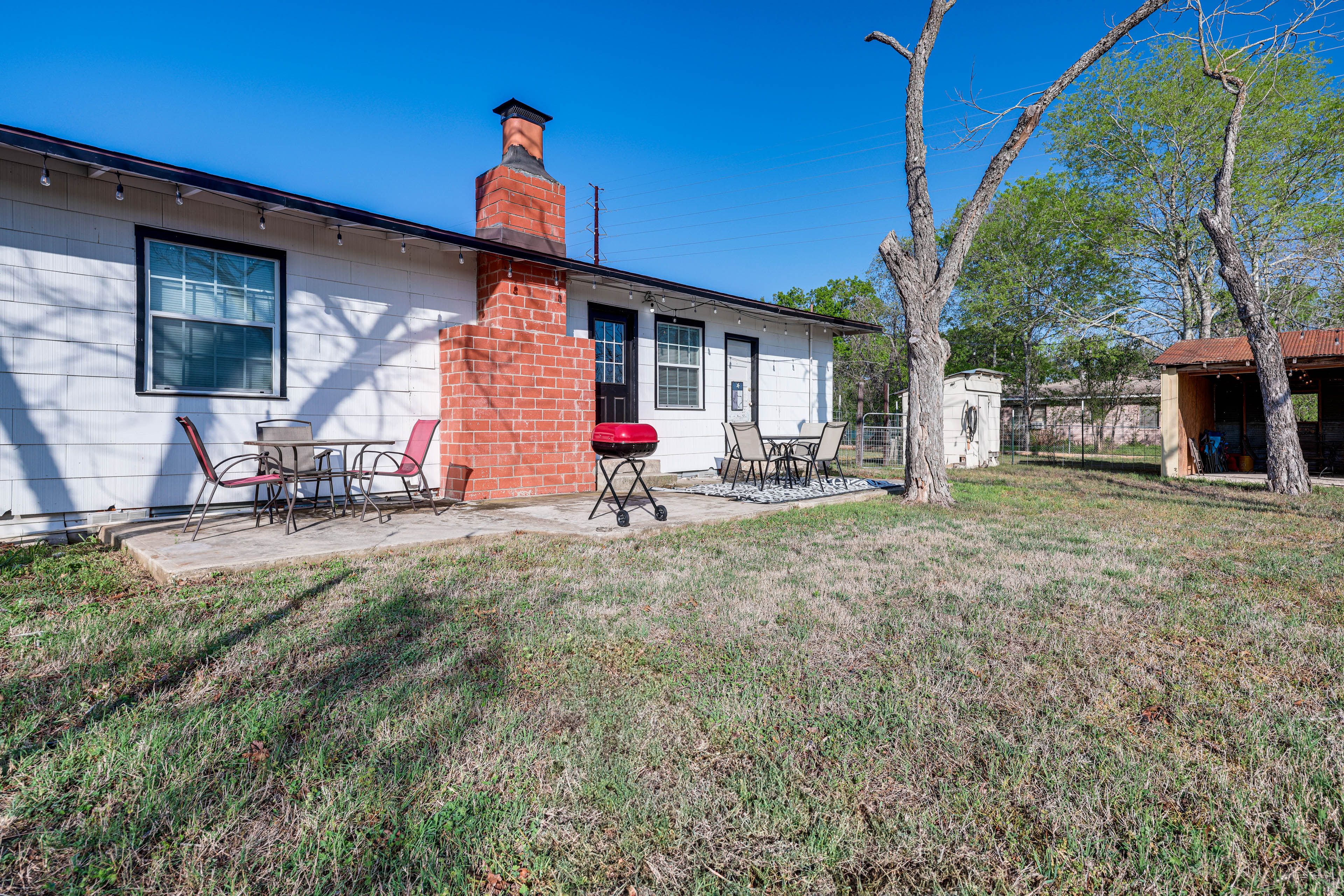 Patio | Charcoal Grill | 2 Dining Areas