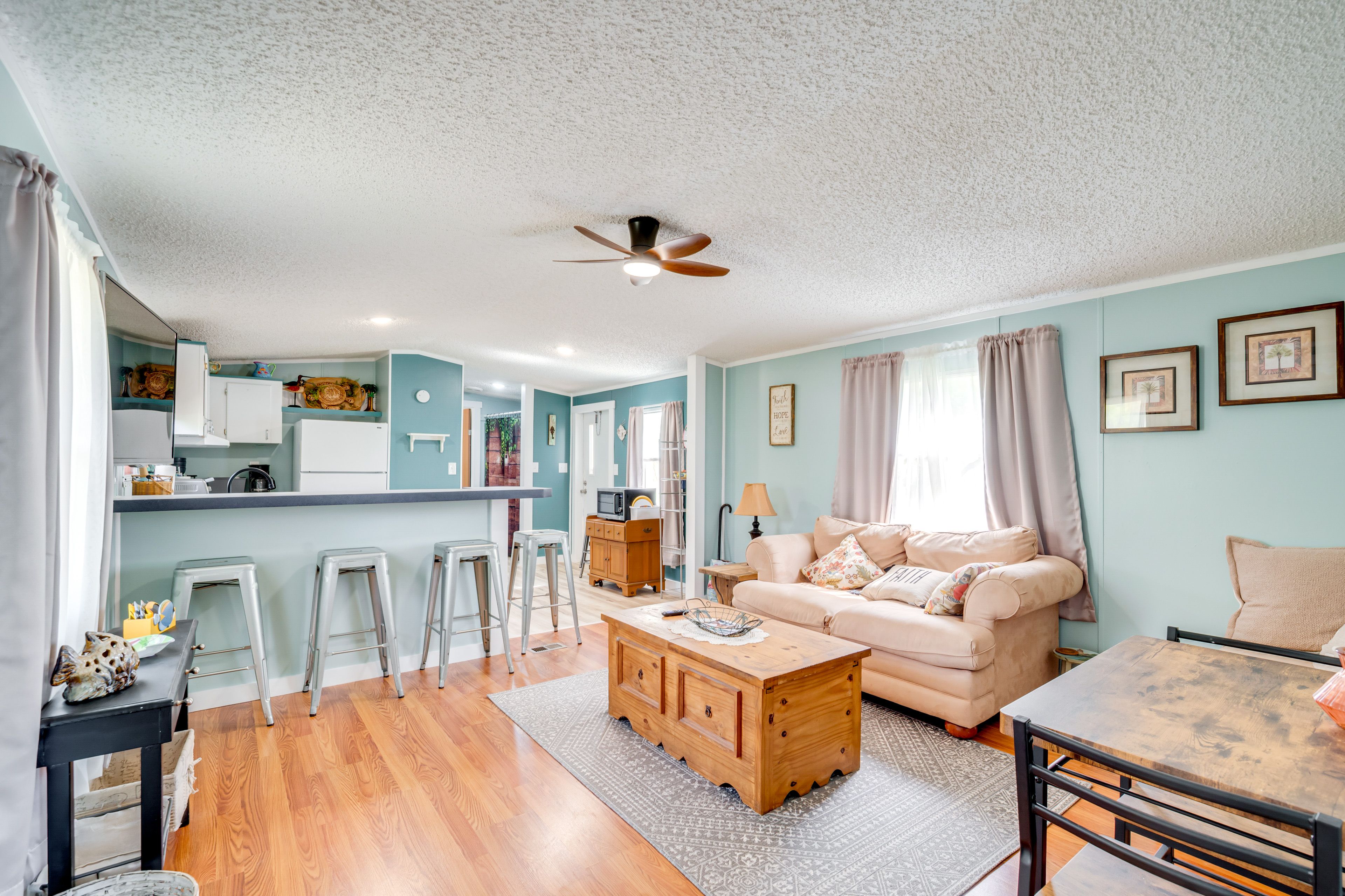 Living Area | Dining Table | Dishware/Flatware | Flat-Screen TV