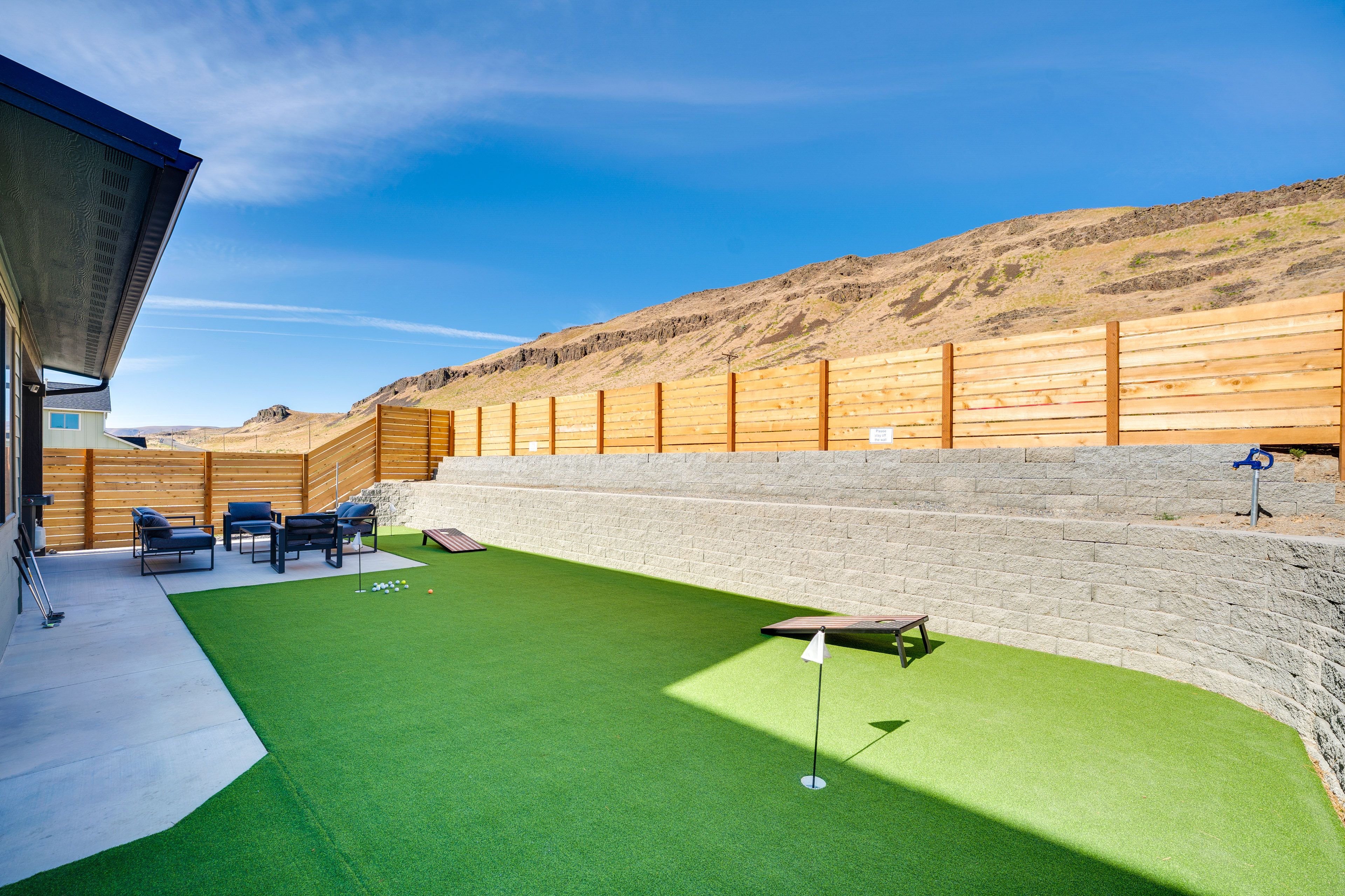 Fully Fenced Backyard | Putting Green & Cornhole