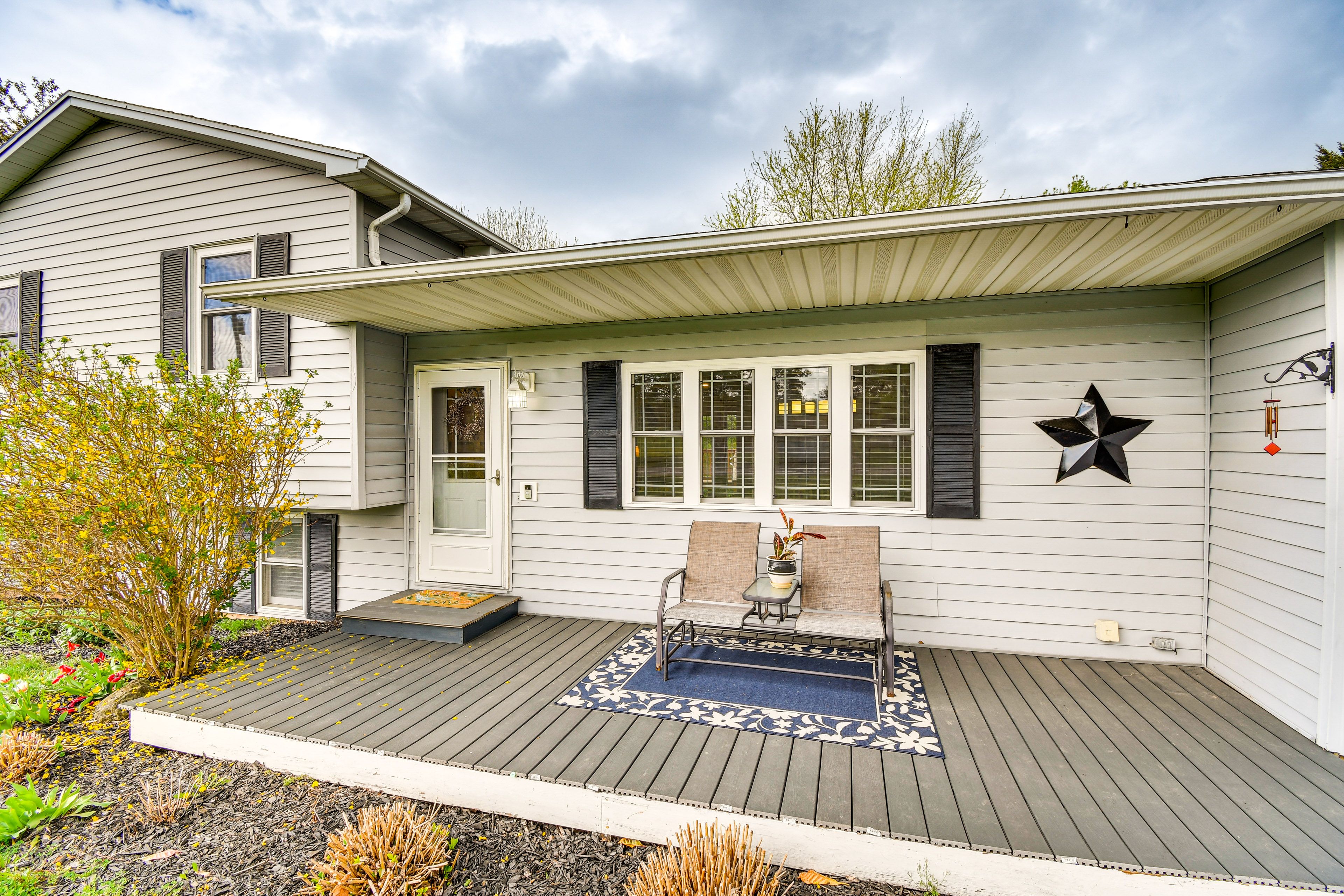 Property Exterior | Tri-Level Home | Spacious Yard