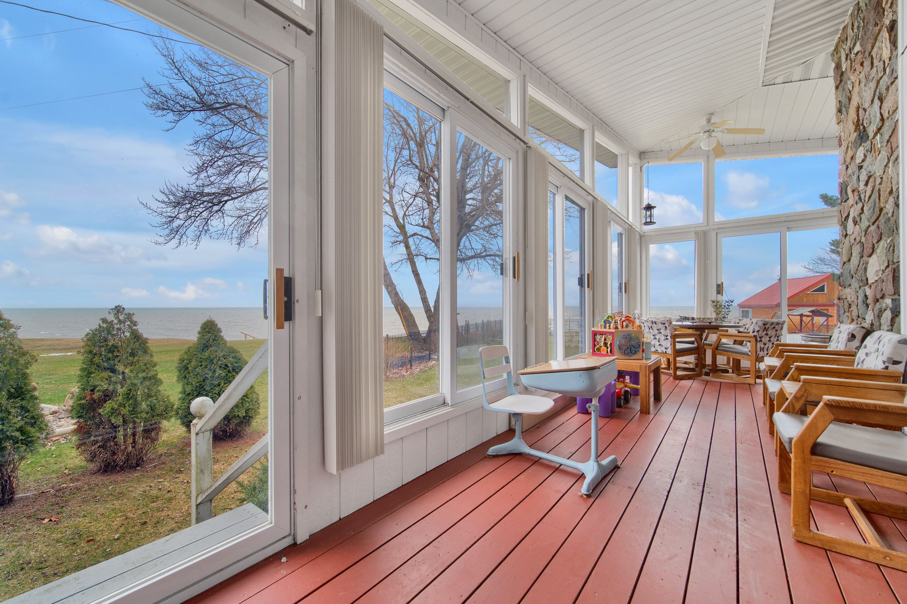 Sunroom | 1st Floor | Seating | Dining Area | Lake Views