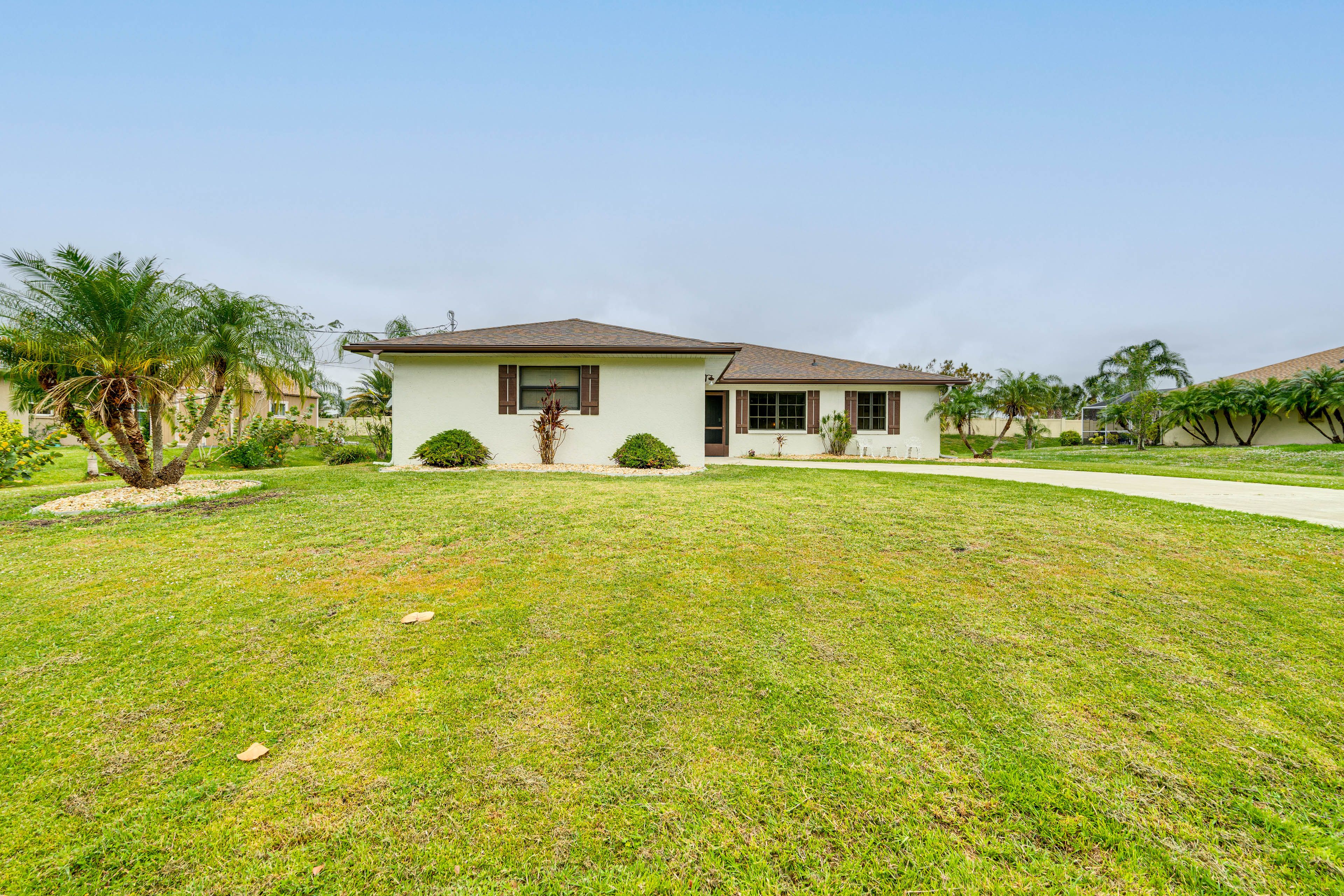 Property Exterior | Single-Story Home | Spacious Yard