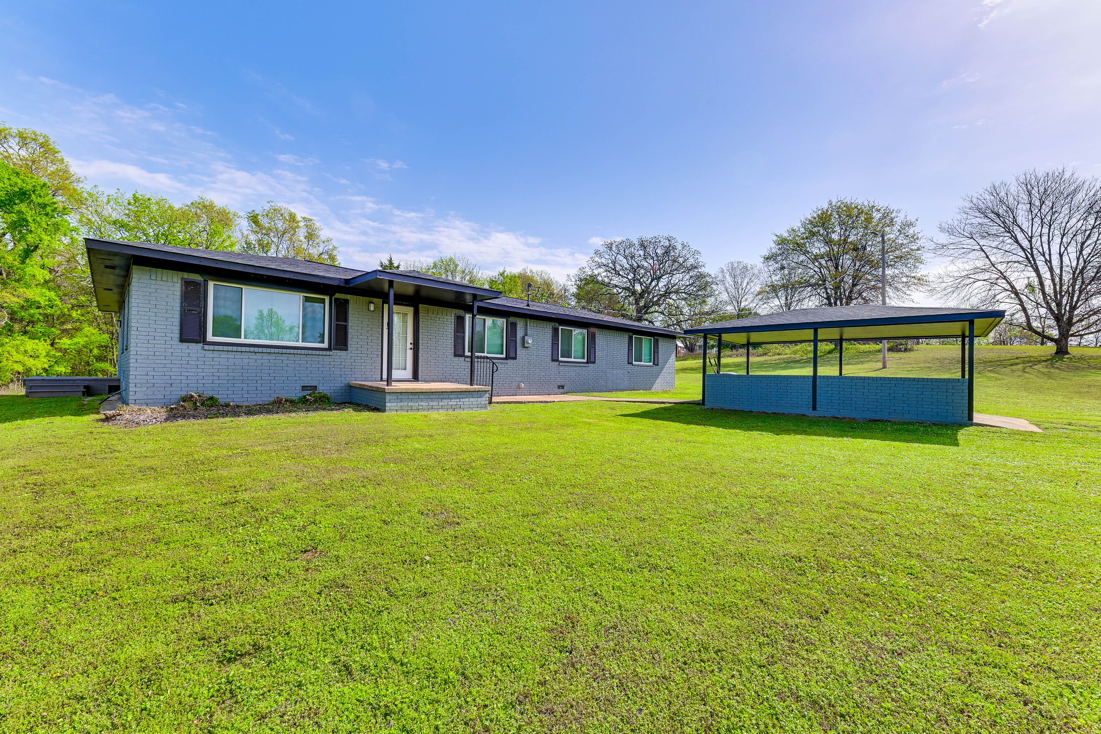 Property Exterior | Single-Story Home | Spacious Yard