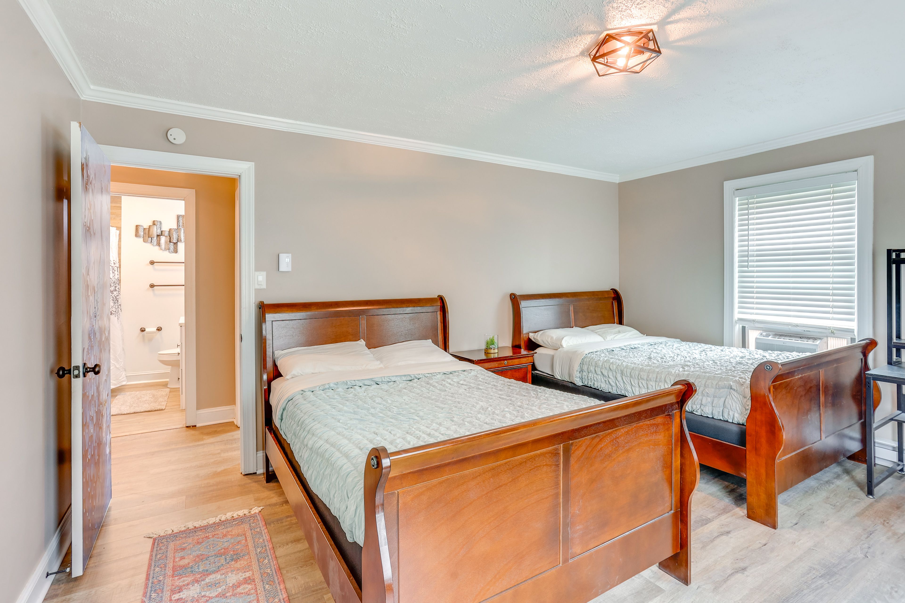 Bedroom 2 | 2 Full Beds | Laptop Workspace | Free WiFi | 2nd Floor