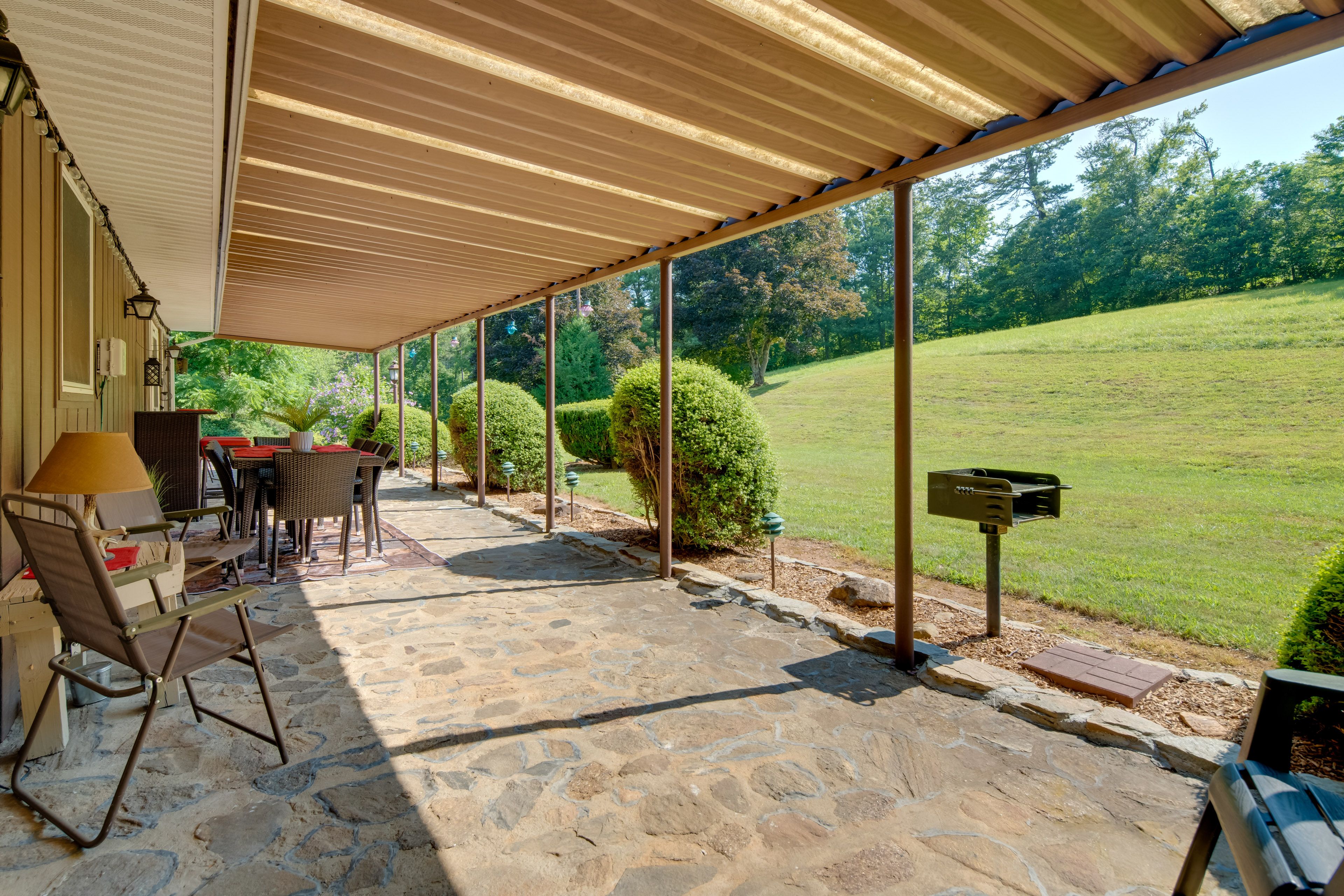 Rear Porch | Outdoor Dining | 9 Mi to the North Carolina Arboretum