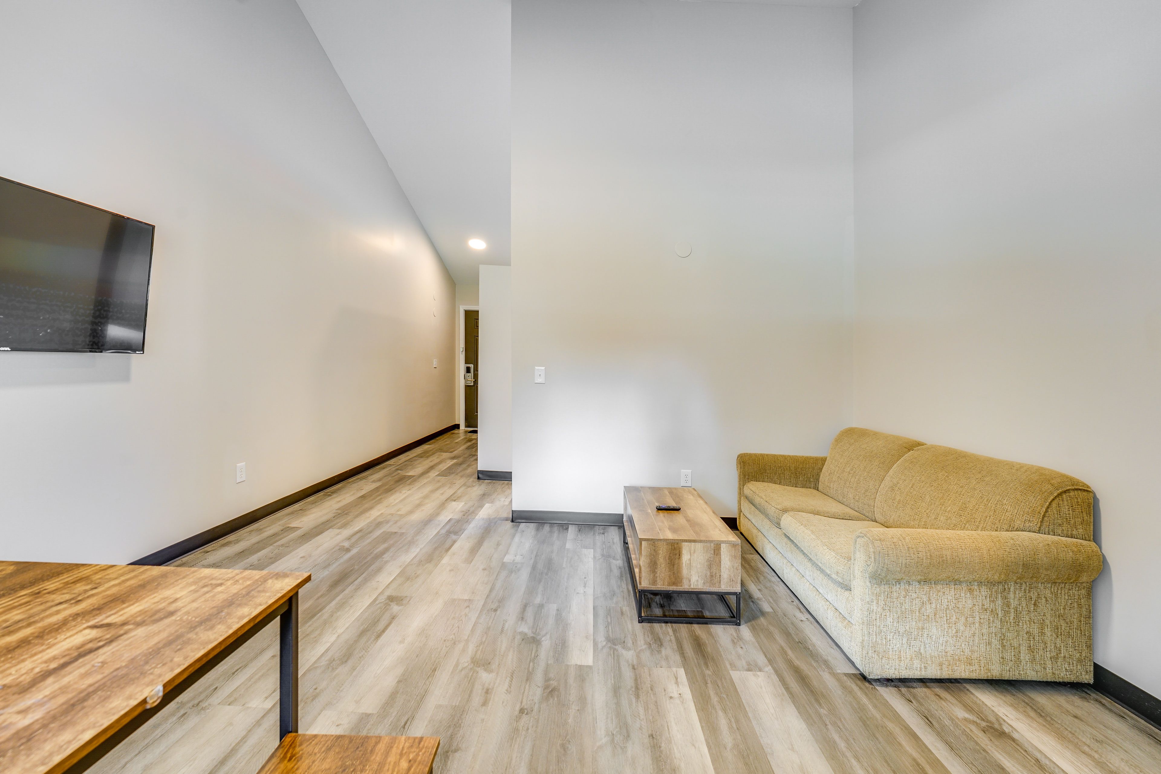 Studio | Full Sleeper Sofa | Dining Table | Single-Story Unit