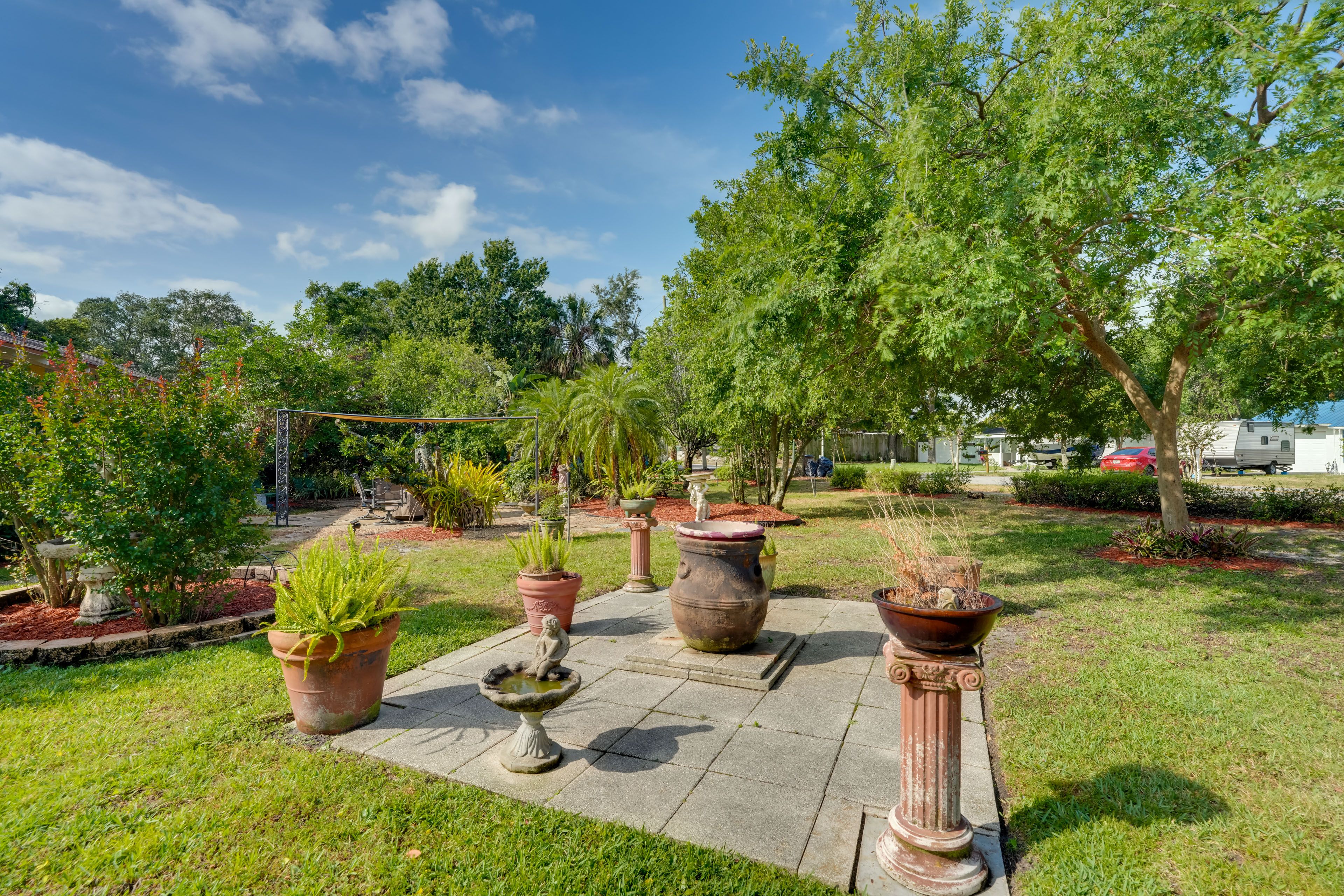 Exterior | Shared Amenities | Yard | Pond w/ Goldfish