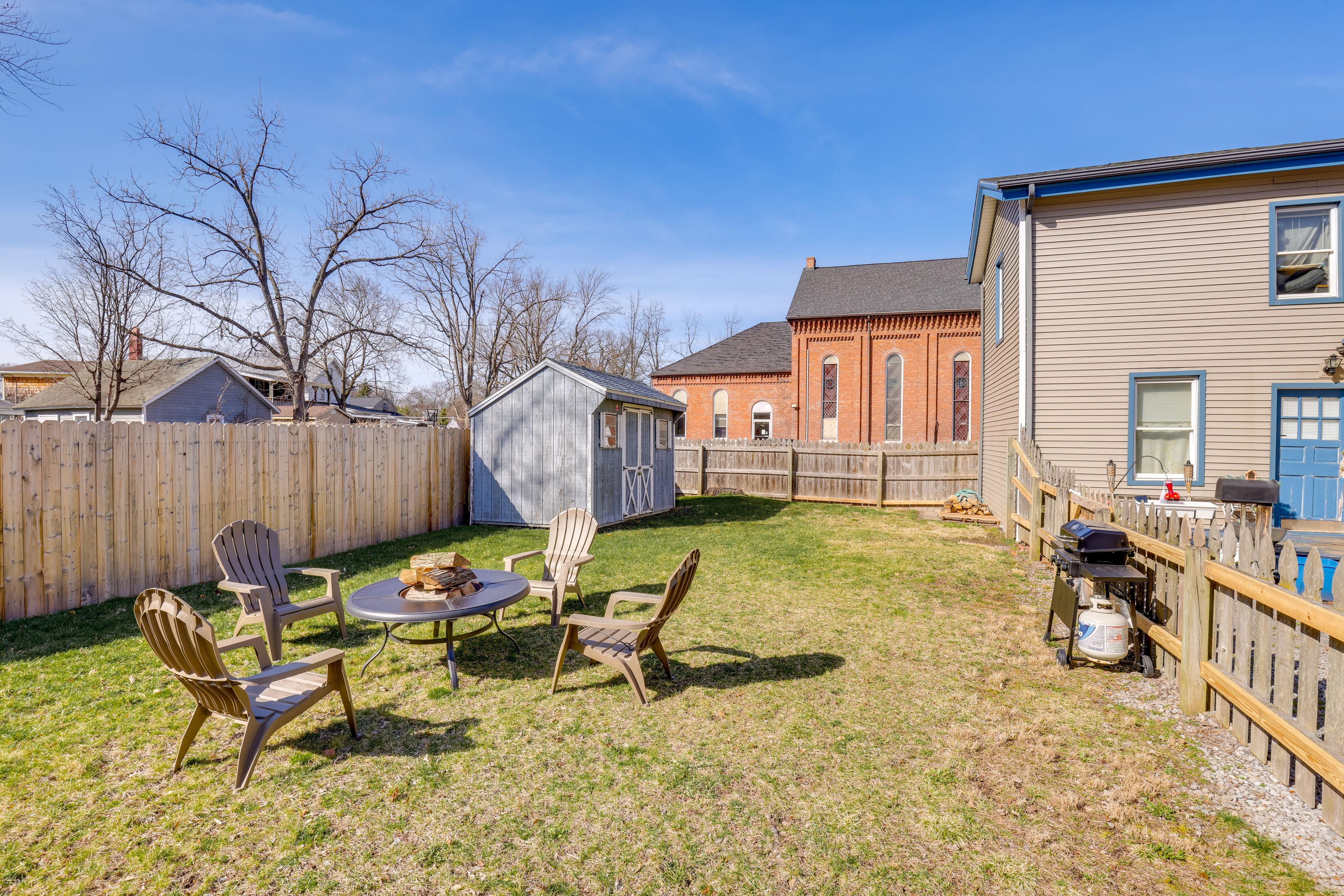 Apartment Exterior | Fire Pit (Wood Provided) | 2 Grills | Fenced Yard