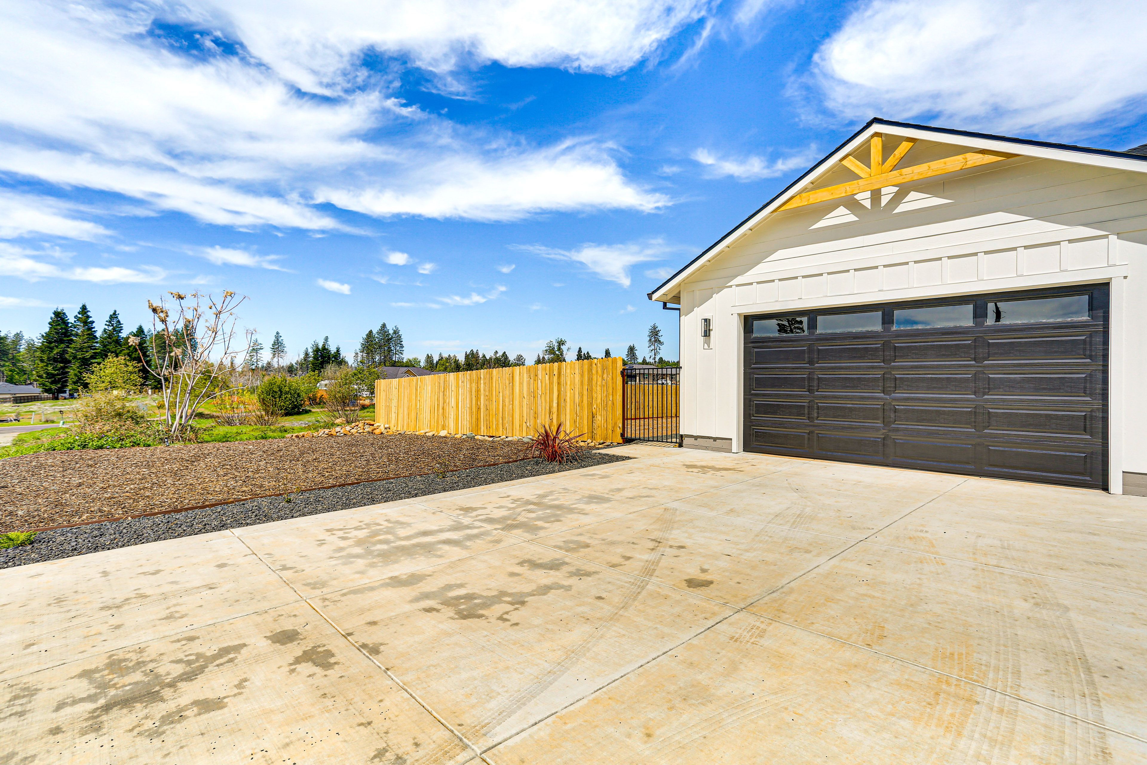Parking | Garage (2 Vehicles) | Driveway (2 Vehicles) | EV Charger