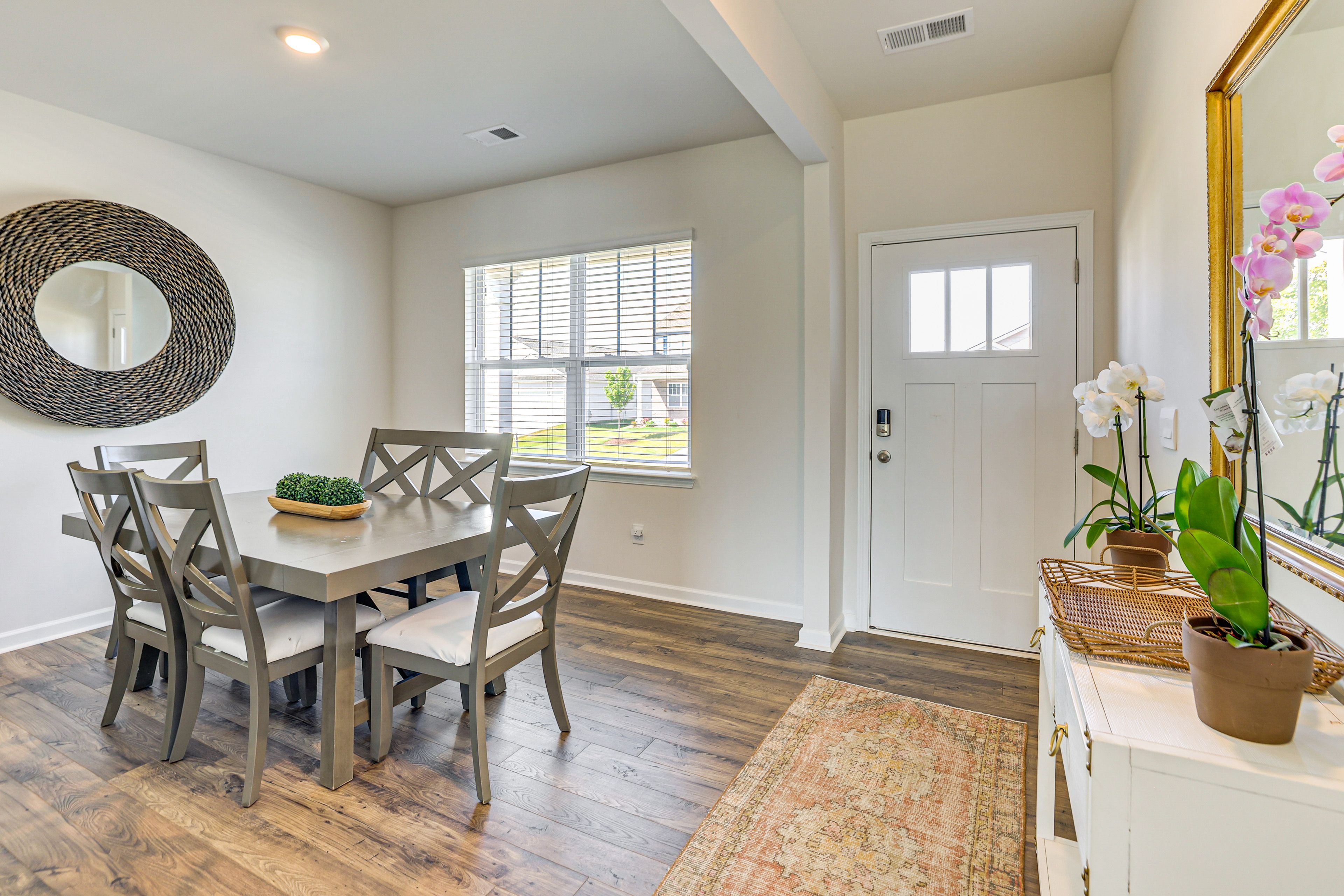 Dining Area | Dishware & Flatware | Central A/C & Heat | 1st Floor