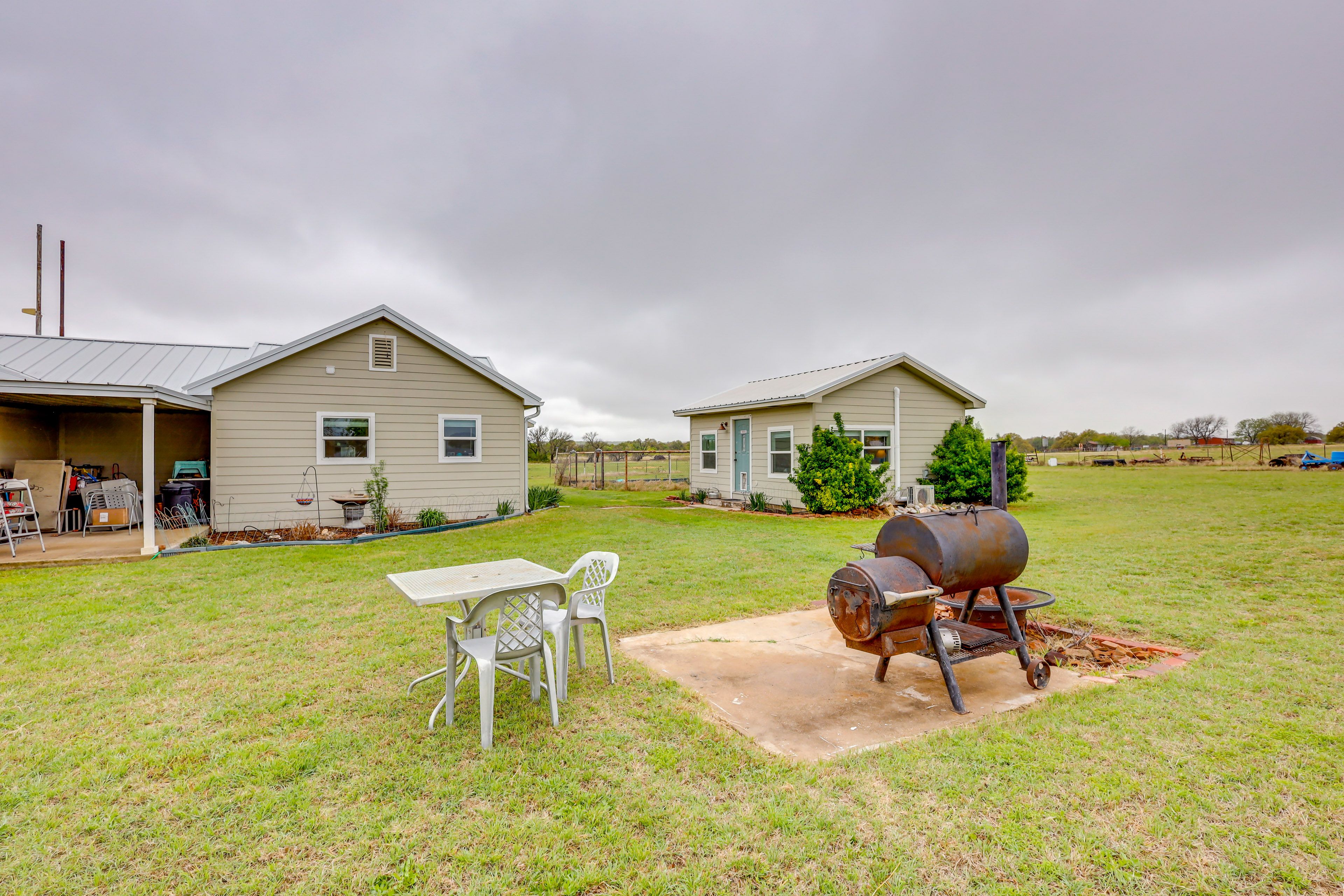 Property Exterior | Shared Grill Area | Designated Parking (2 Vehicles)