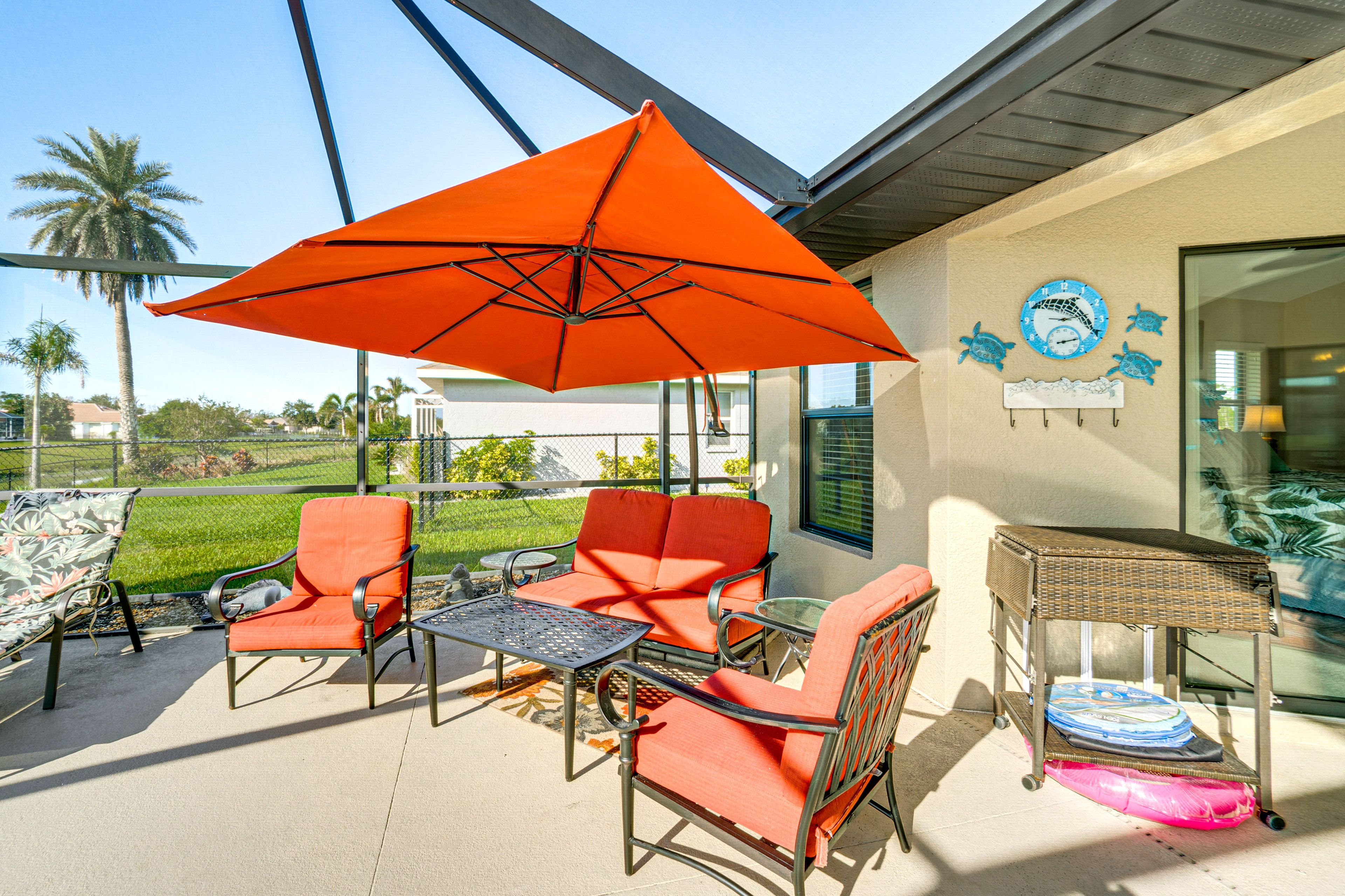 House Exterior | Furnished Lanai | Lounge Chairs | Pool Floats & Toys