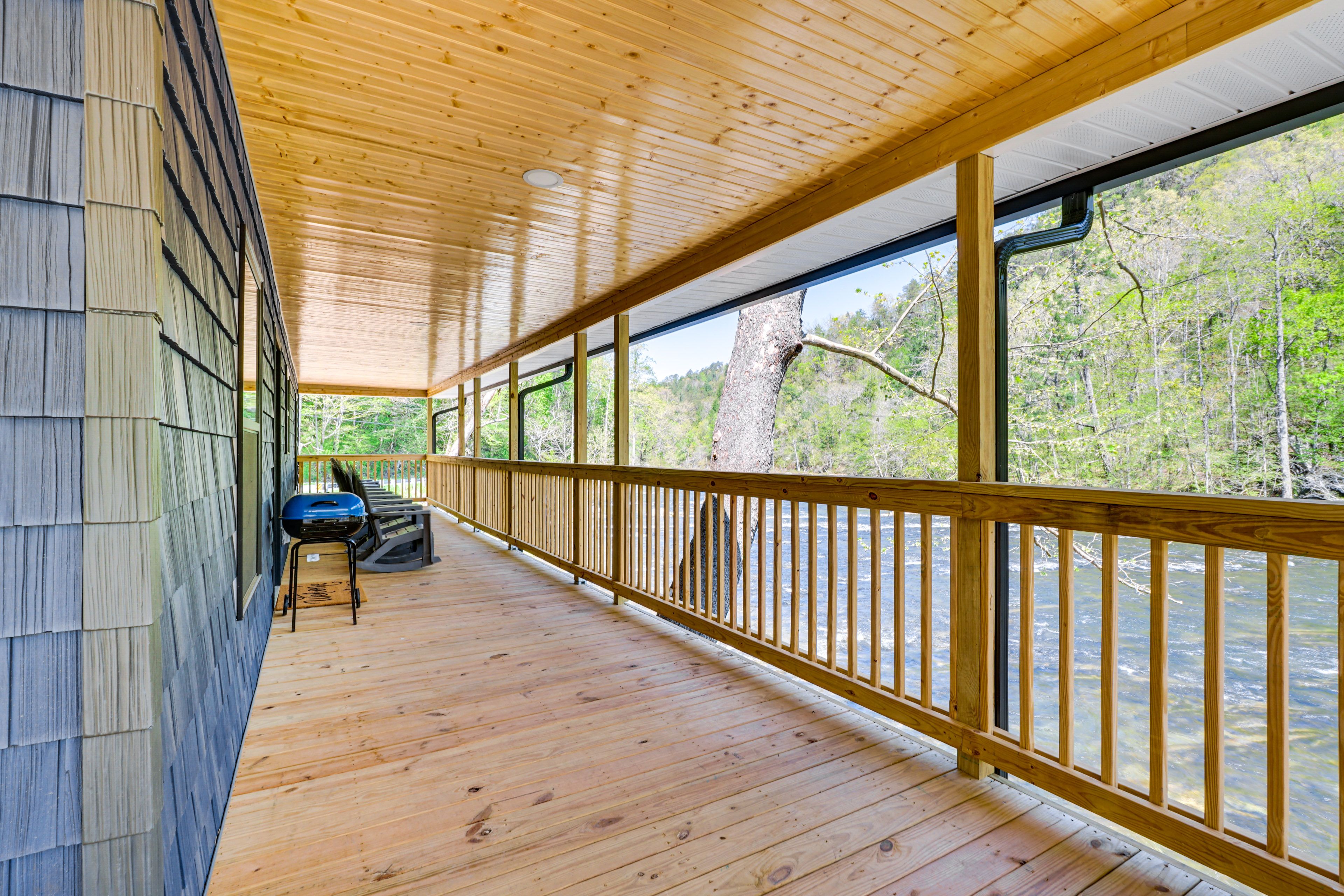 Covered Wraparound Deck | Rocking Chairs | Charcoal Grill