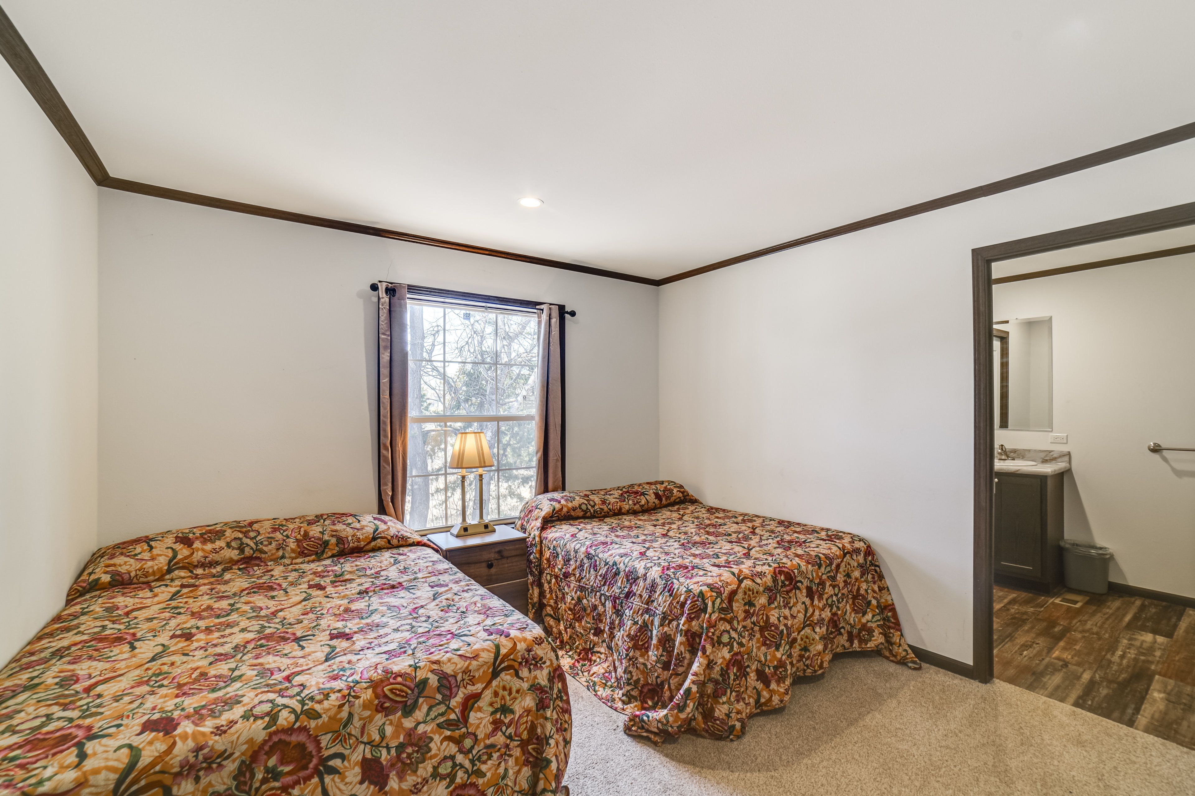 Bedroom 1 | 2 Full Beds | Linens Provided