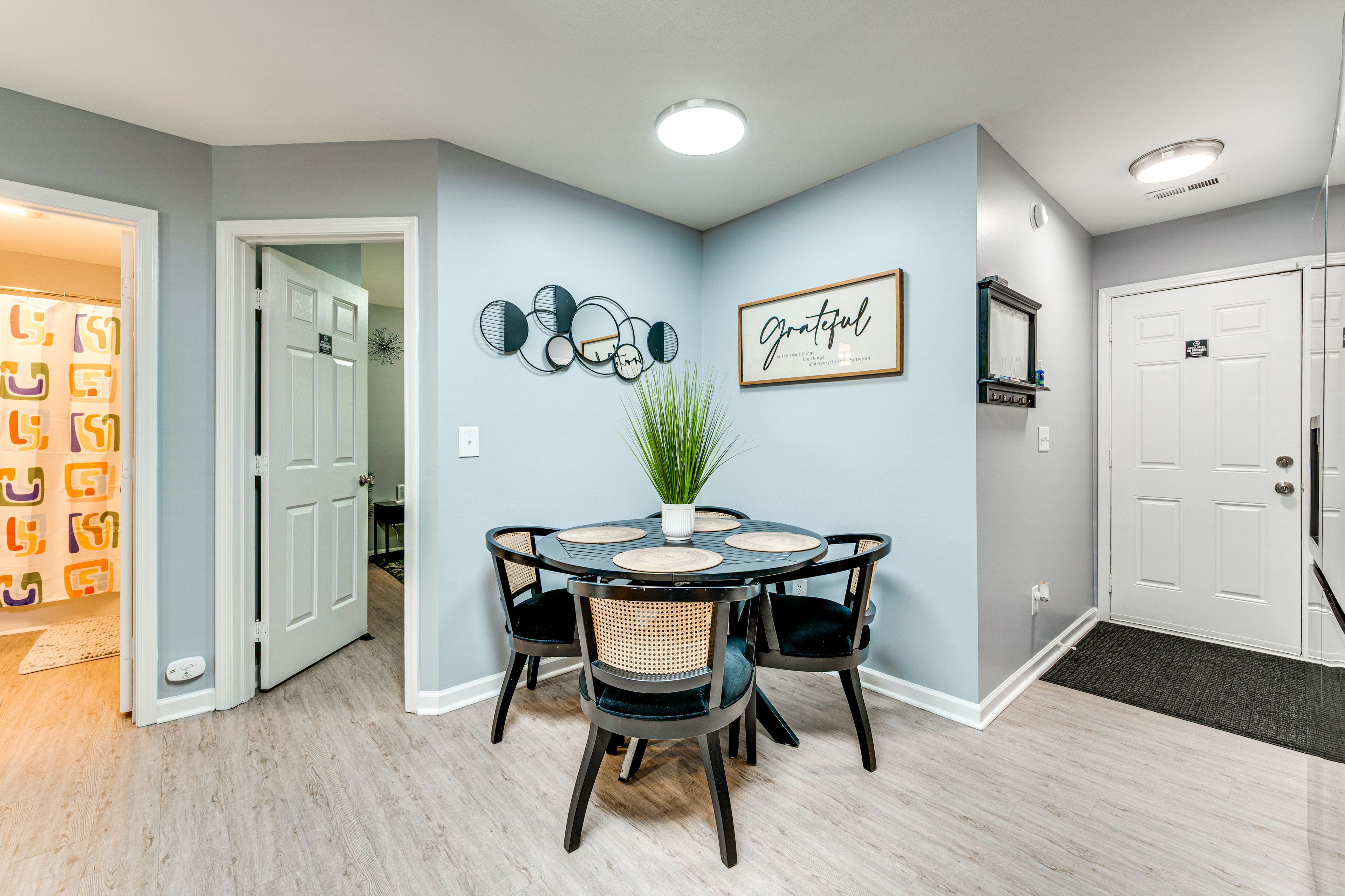 Dining Room | Single-Story Apartment on Upper Floor | Dishware & Flatware