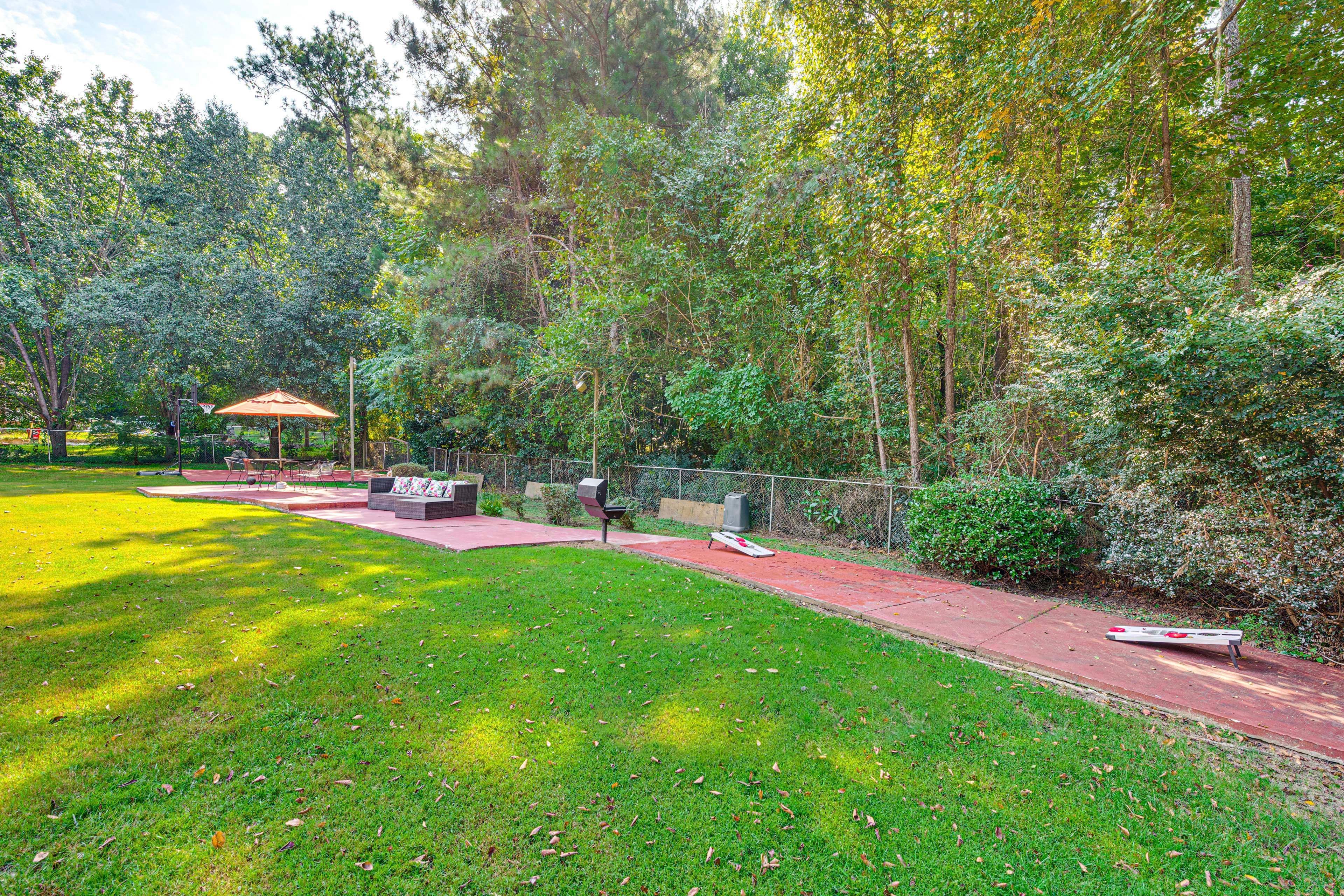 Fenced Backyard | Charcoal Grill | Dining Area | Fire Pit | Cornhole