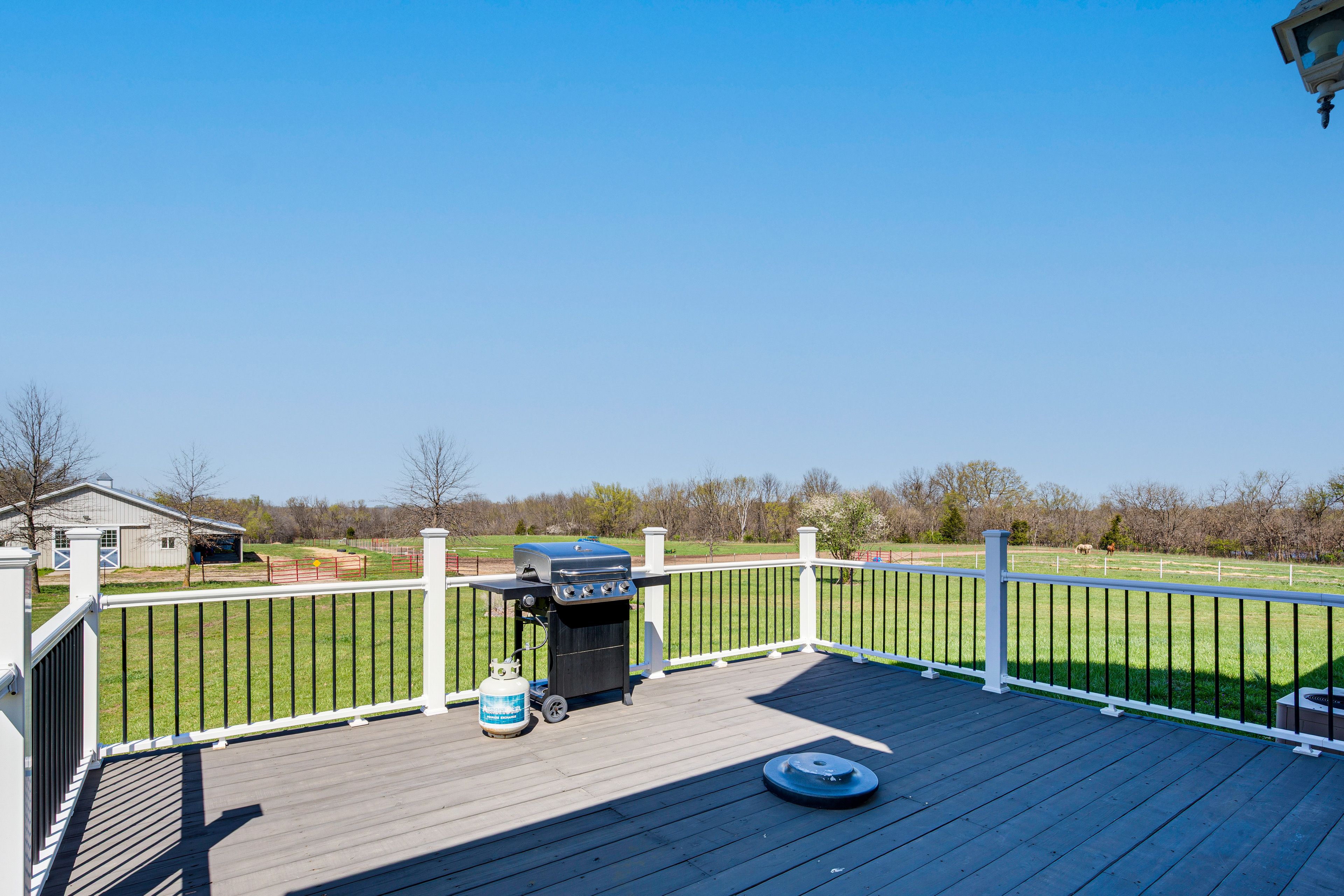 Wraparound Porch | Gas Grill | Rocking Chairs