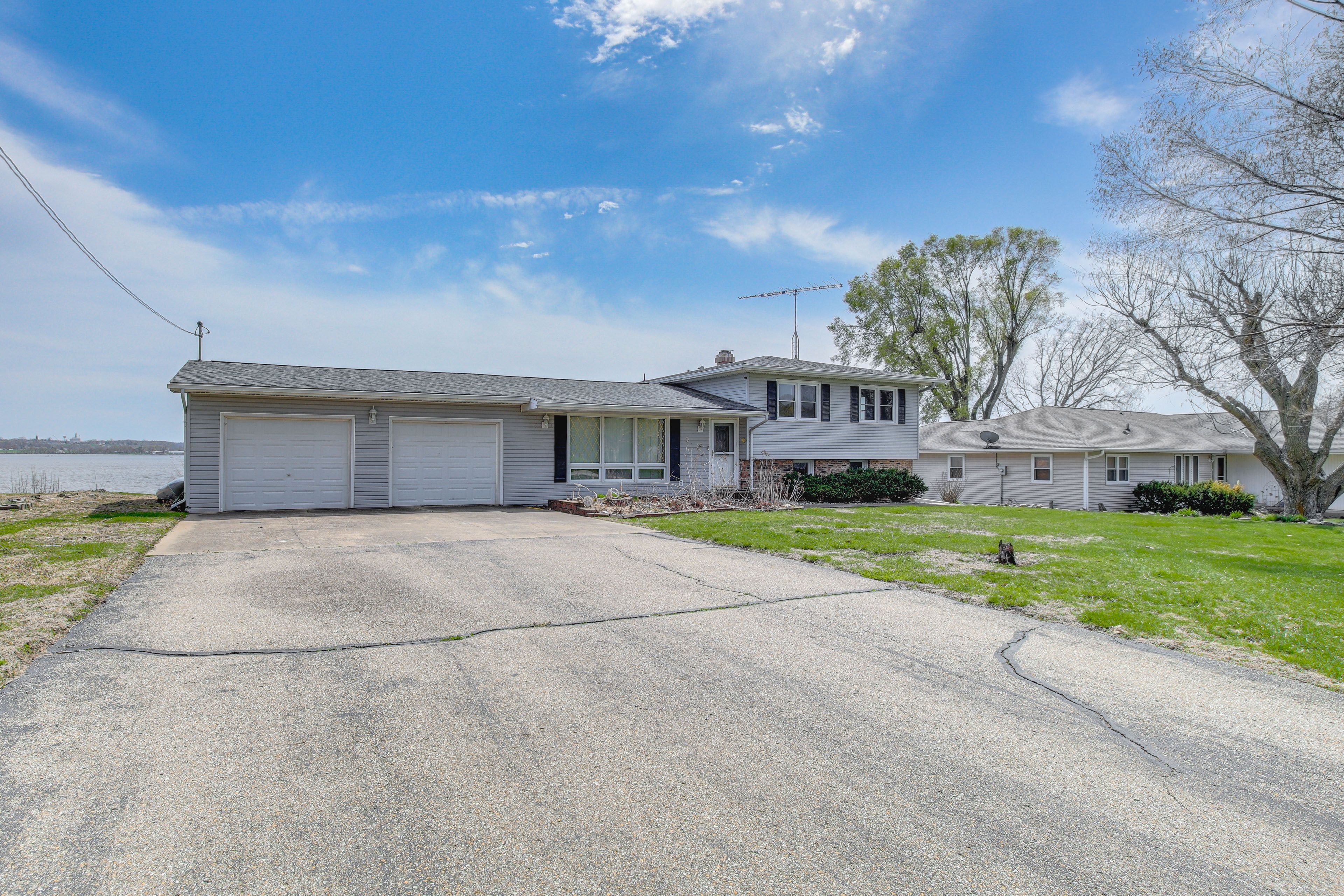 Property Exterior | Spacious Yard | Kayaks & Canoe | Grills | Fire Pit