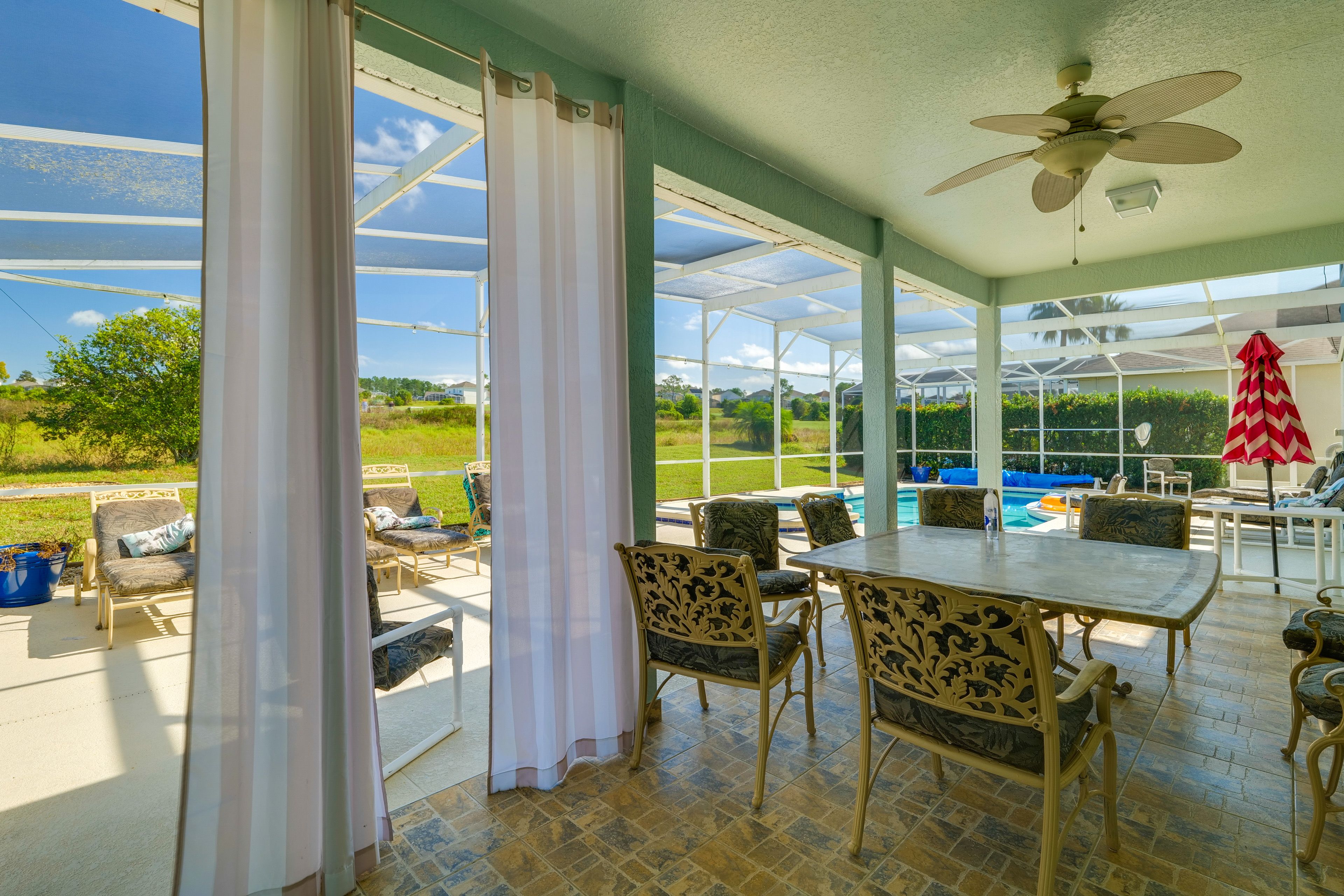 Screened-In Lanai | Dining Area | Golf Course Views | TV