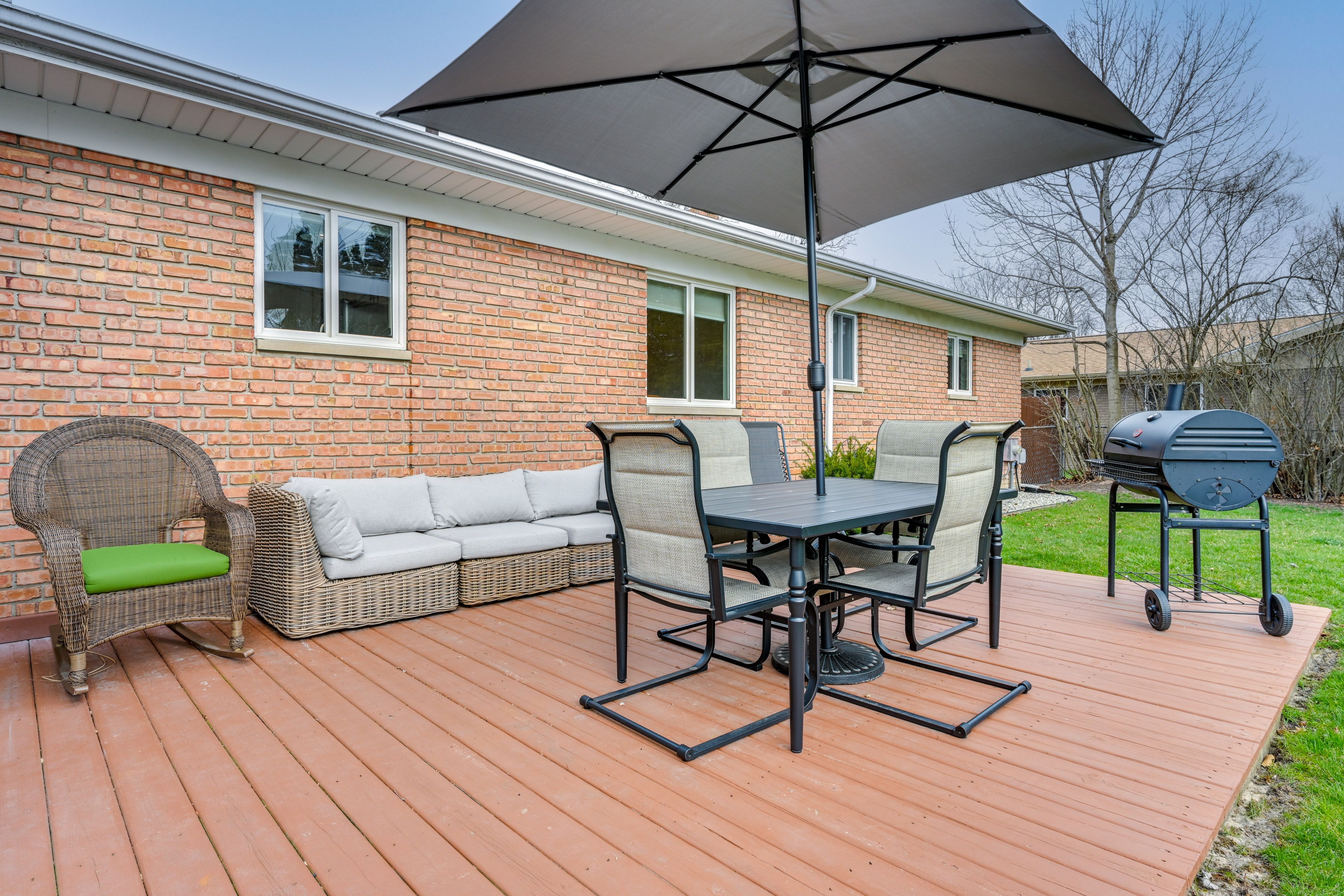 House Exterior | Deck w/ Seating | Dining Area | Charcoal Grill/Smoker
